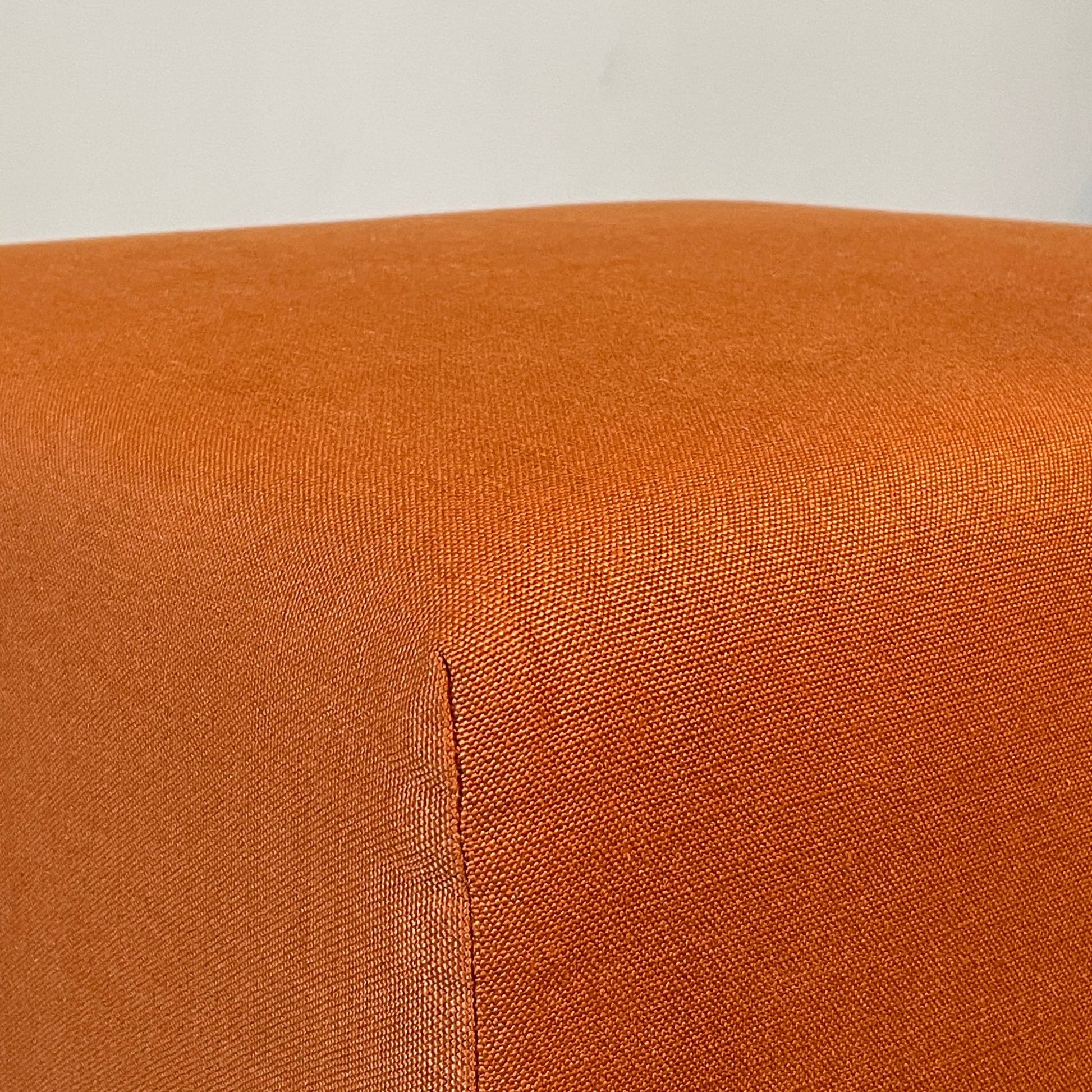 A small B&B Italia P60 ottoman on a white background.