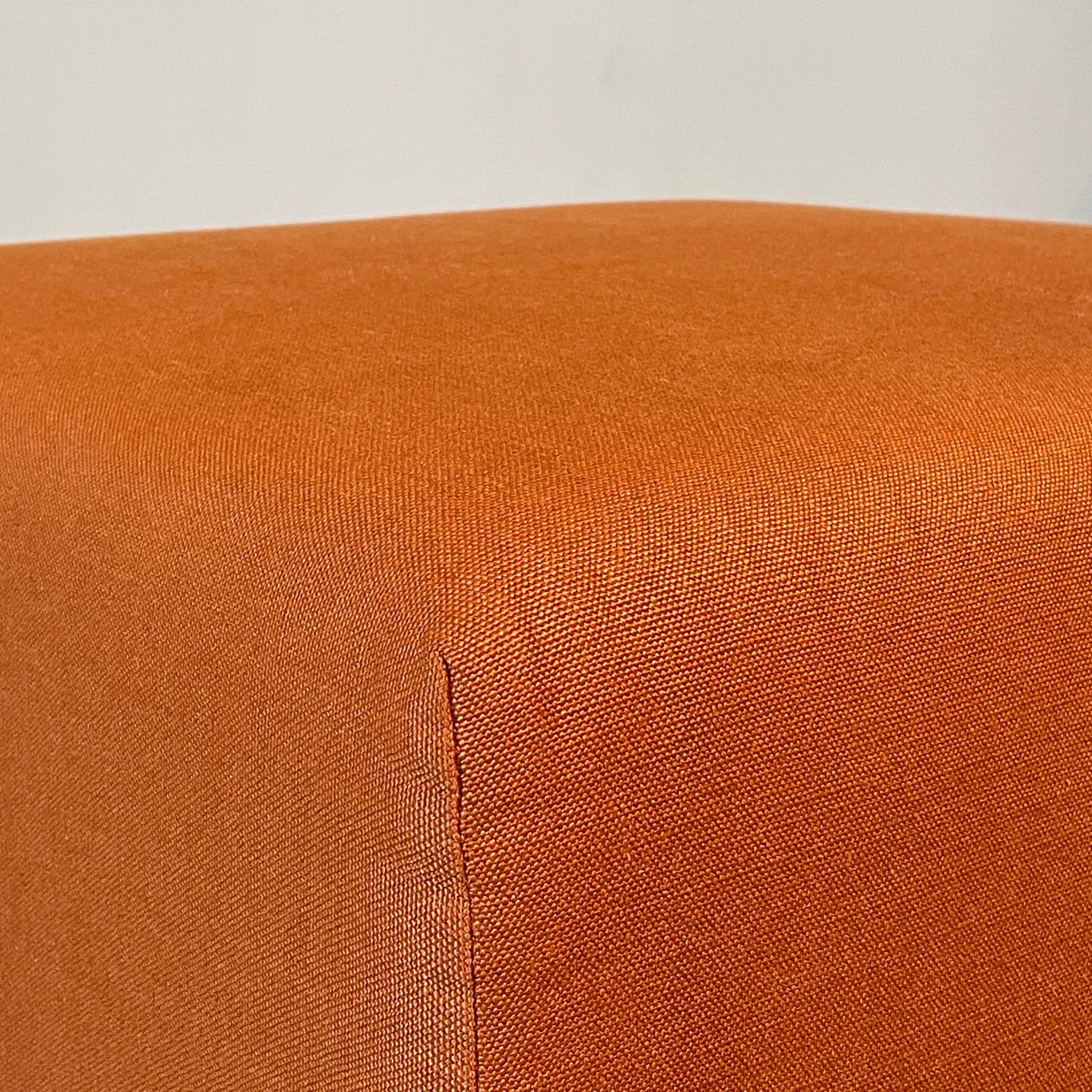 A small B&B Italia P60 ottoman on a white background.