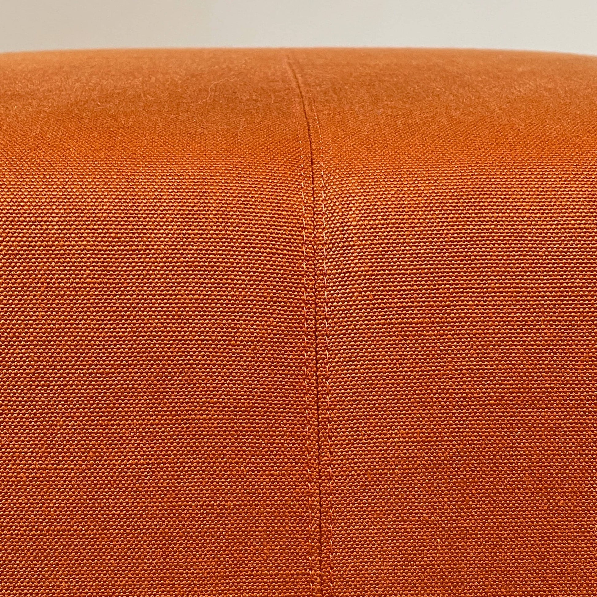 A small B&B Italia P60 ottoman on a white background.