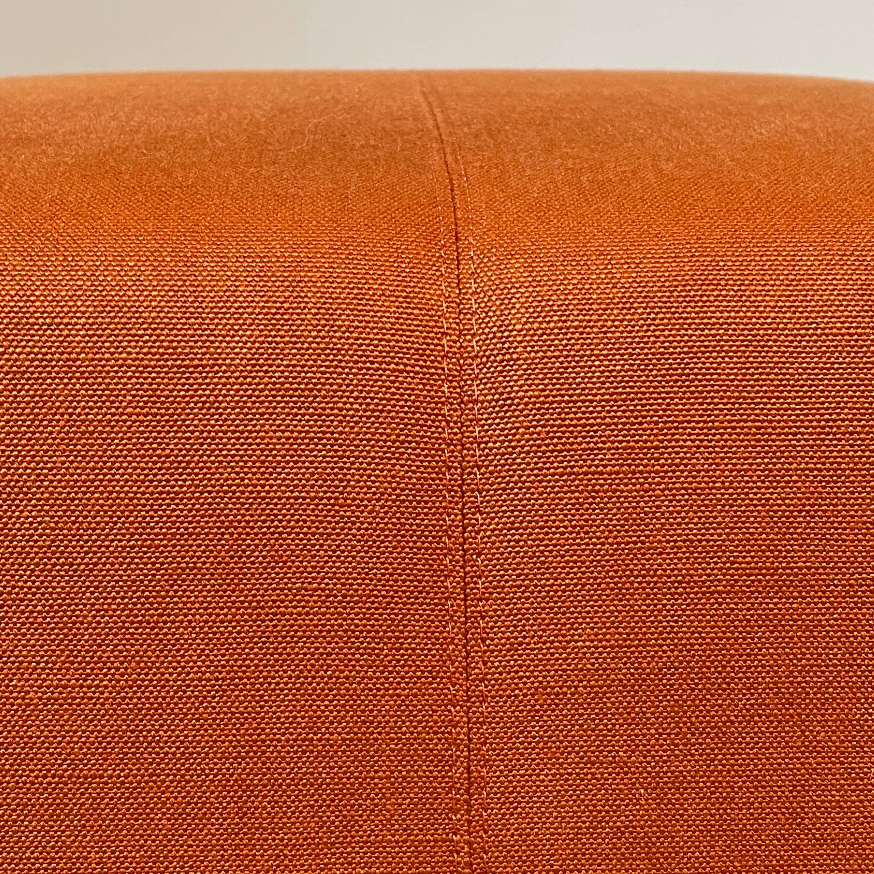 A small B&B Italia P60 ottoman on a white background.