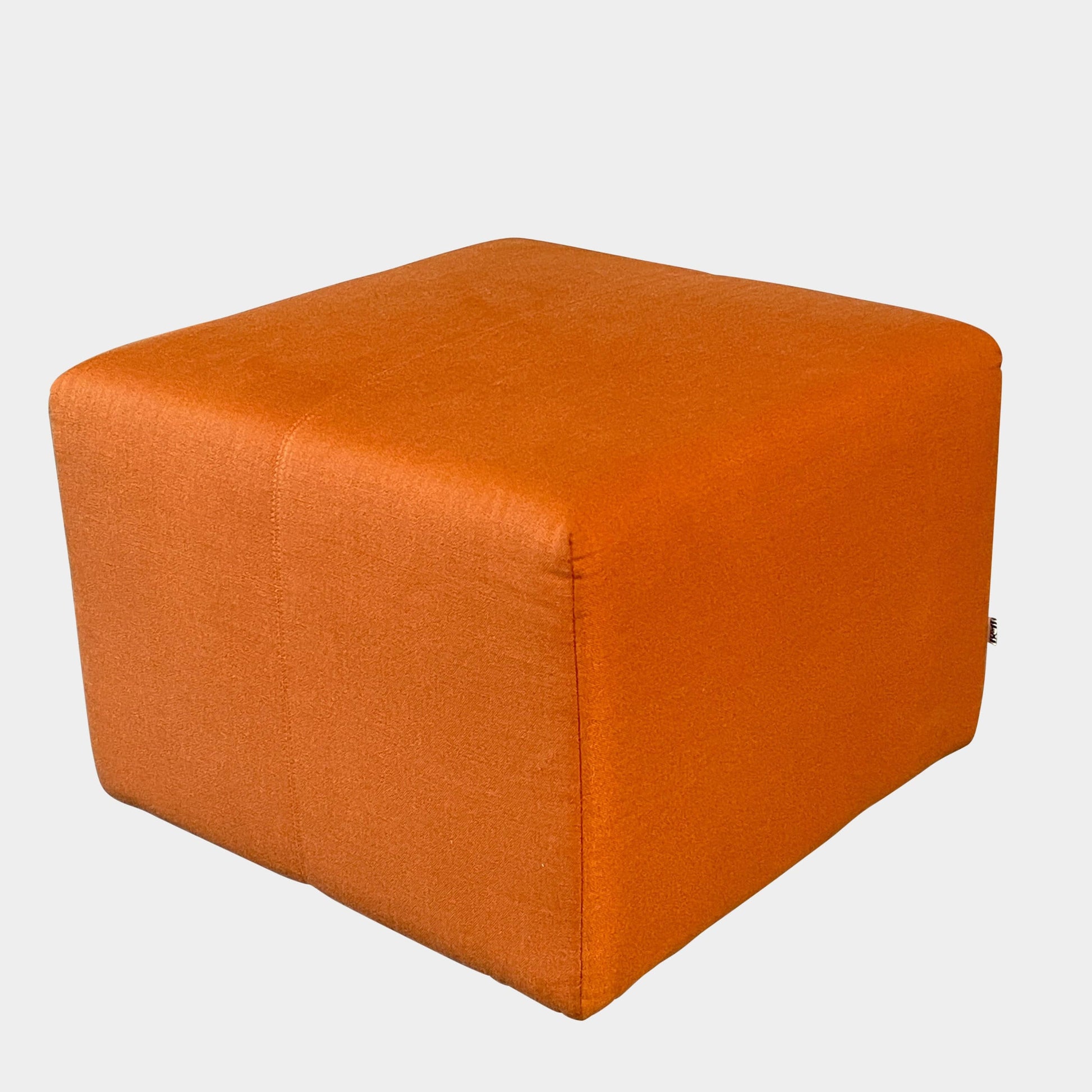 A small B&B Italia P60 ottoman on a white background.