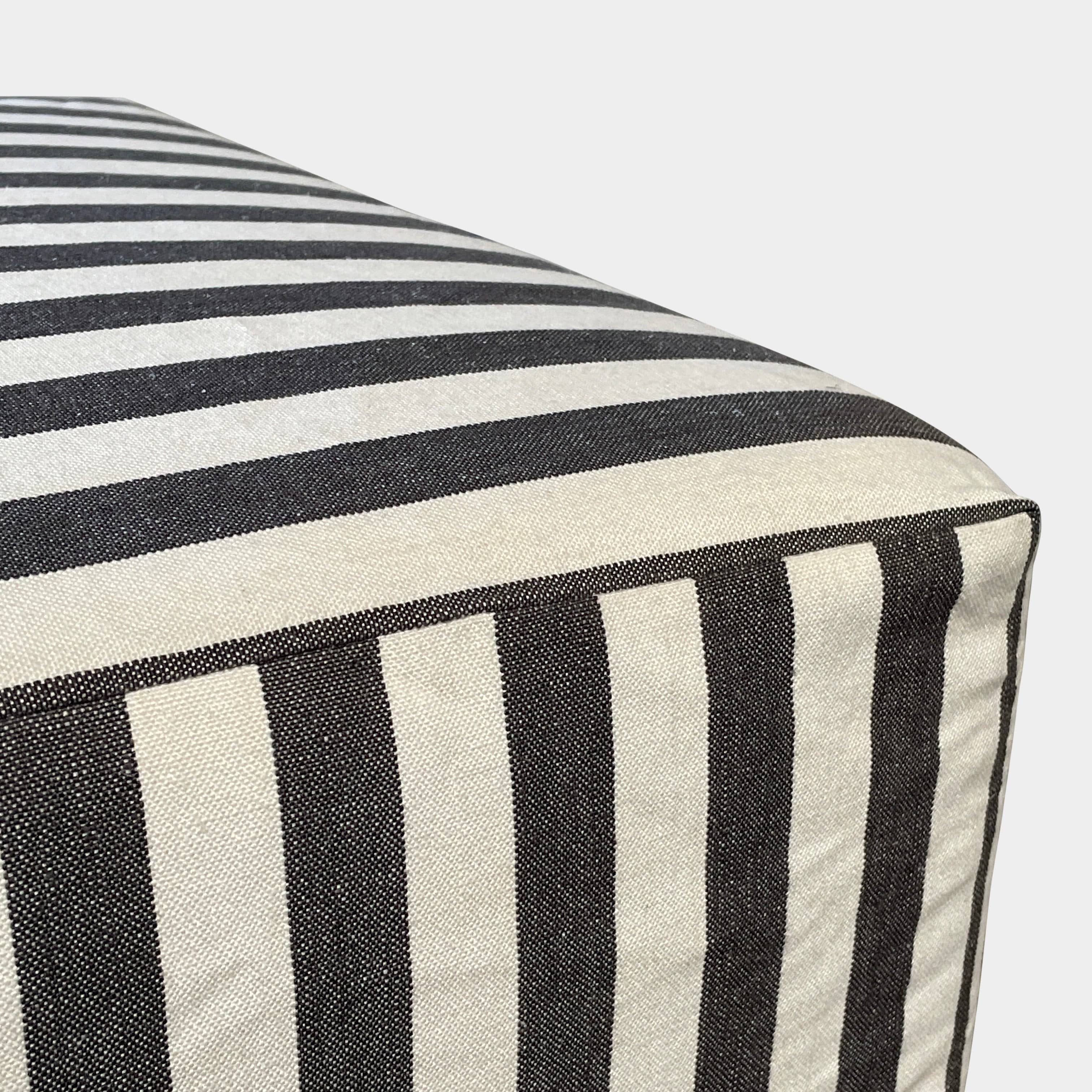 A small B&B Italia P60 ottoman on a white background.