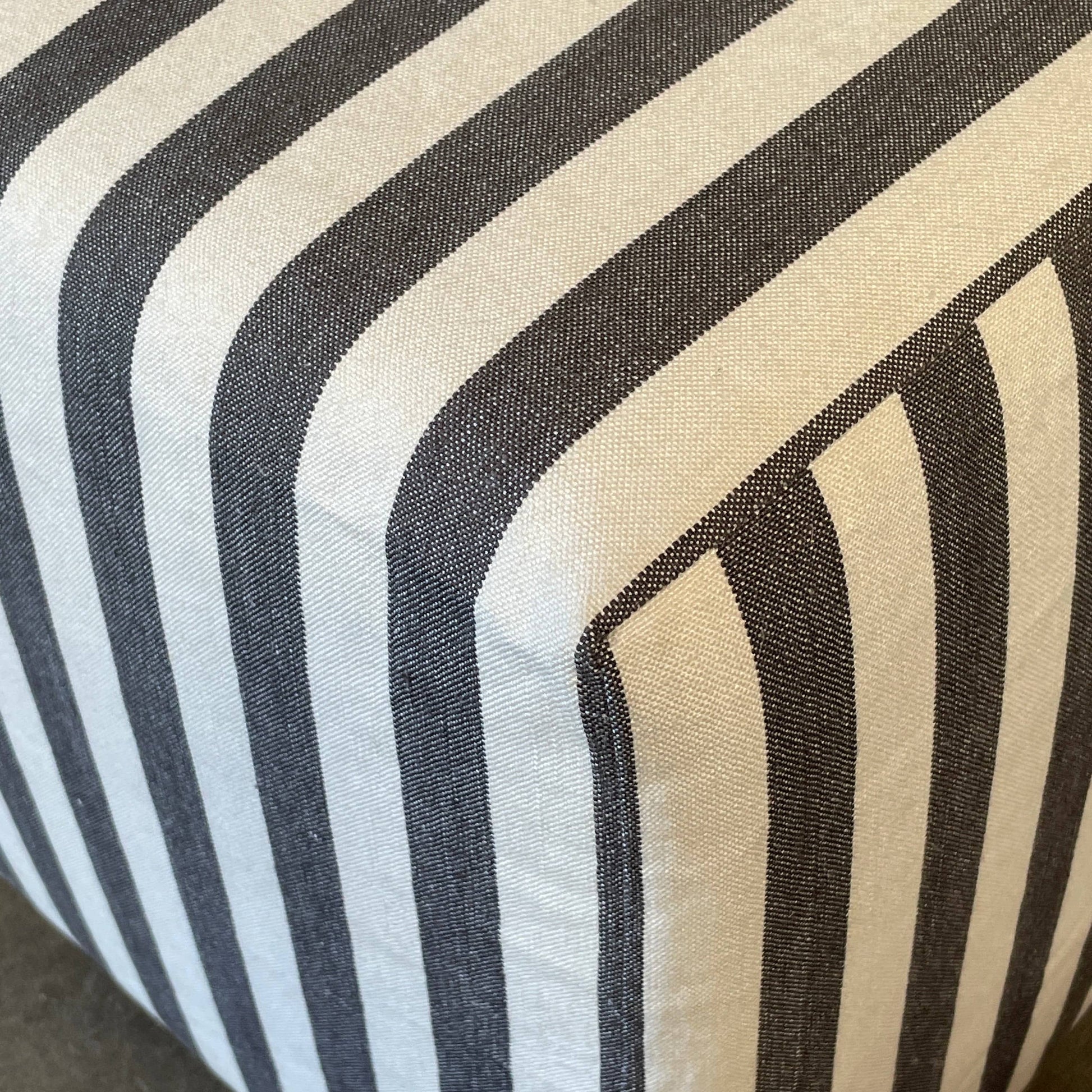A small B&B Italia P60 ottoman on a white background.