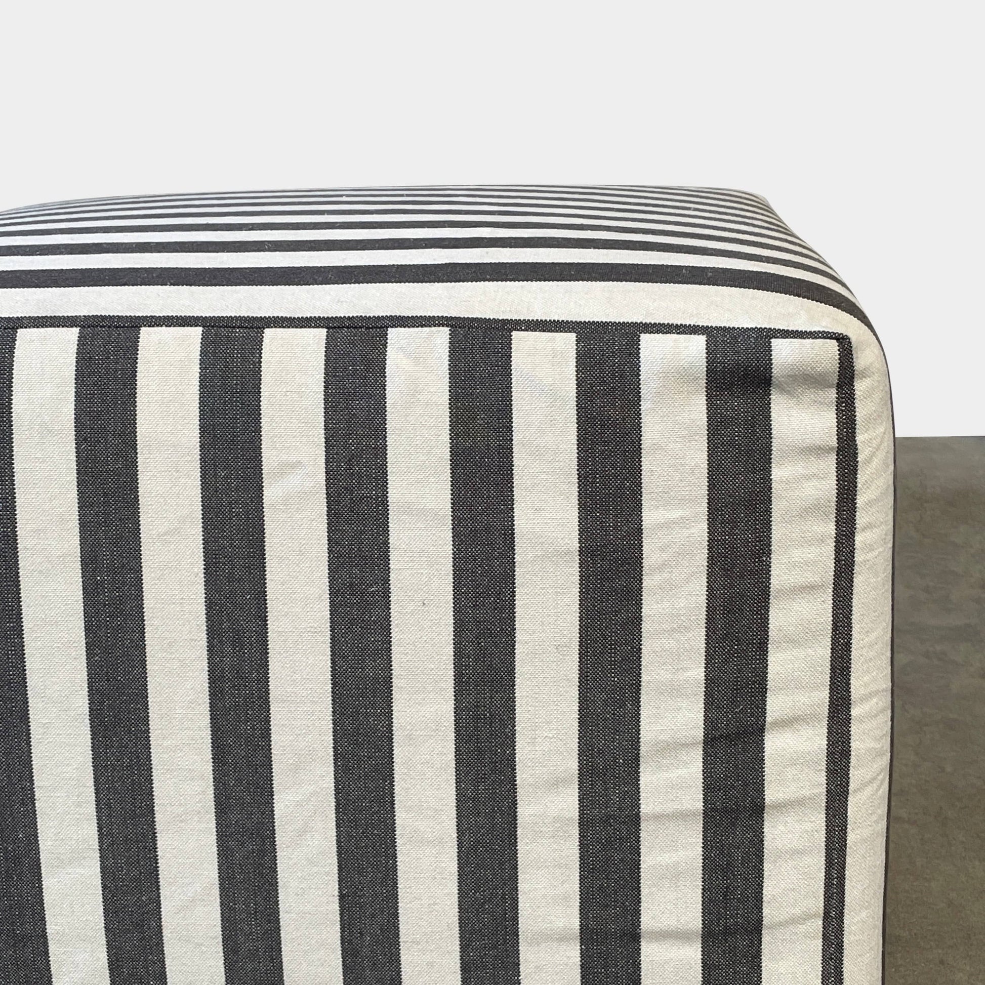 A small B&B Italia P60 ottoman on a white background.