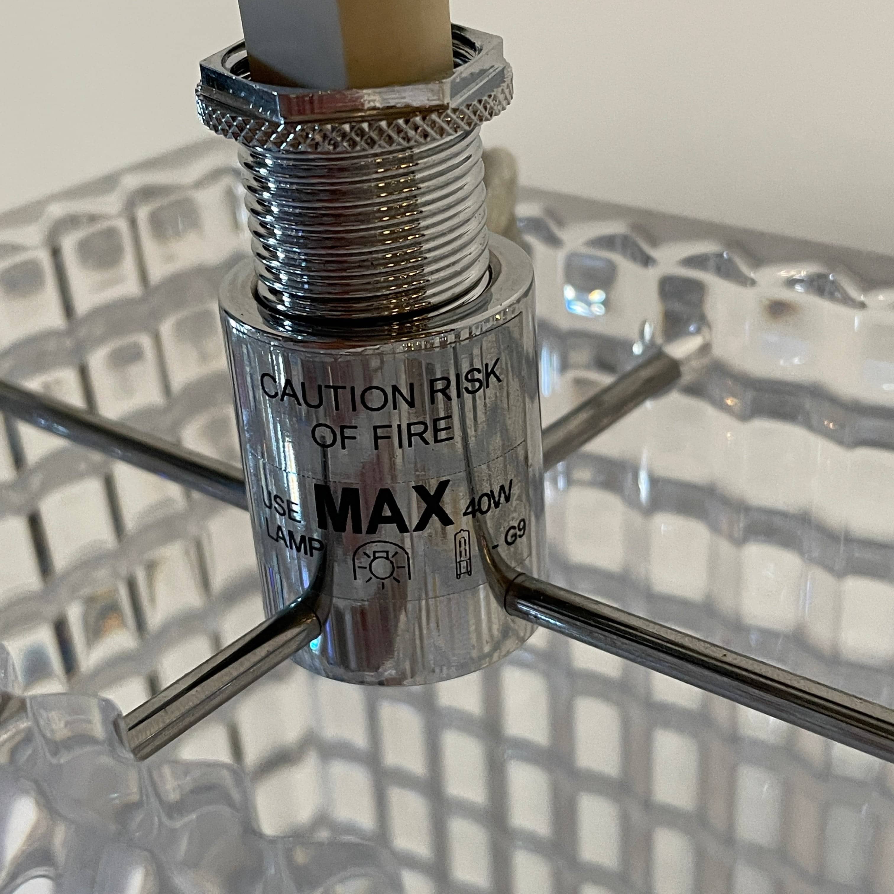 An elegant Baccarat Eye Table Lamp with a white shade designed by Nicolas Triboulot.