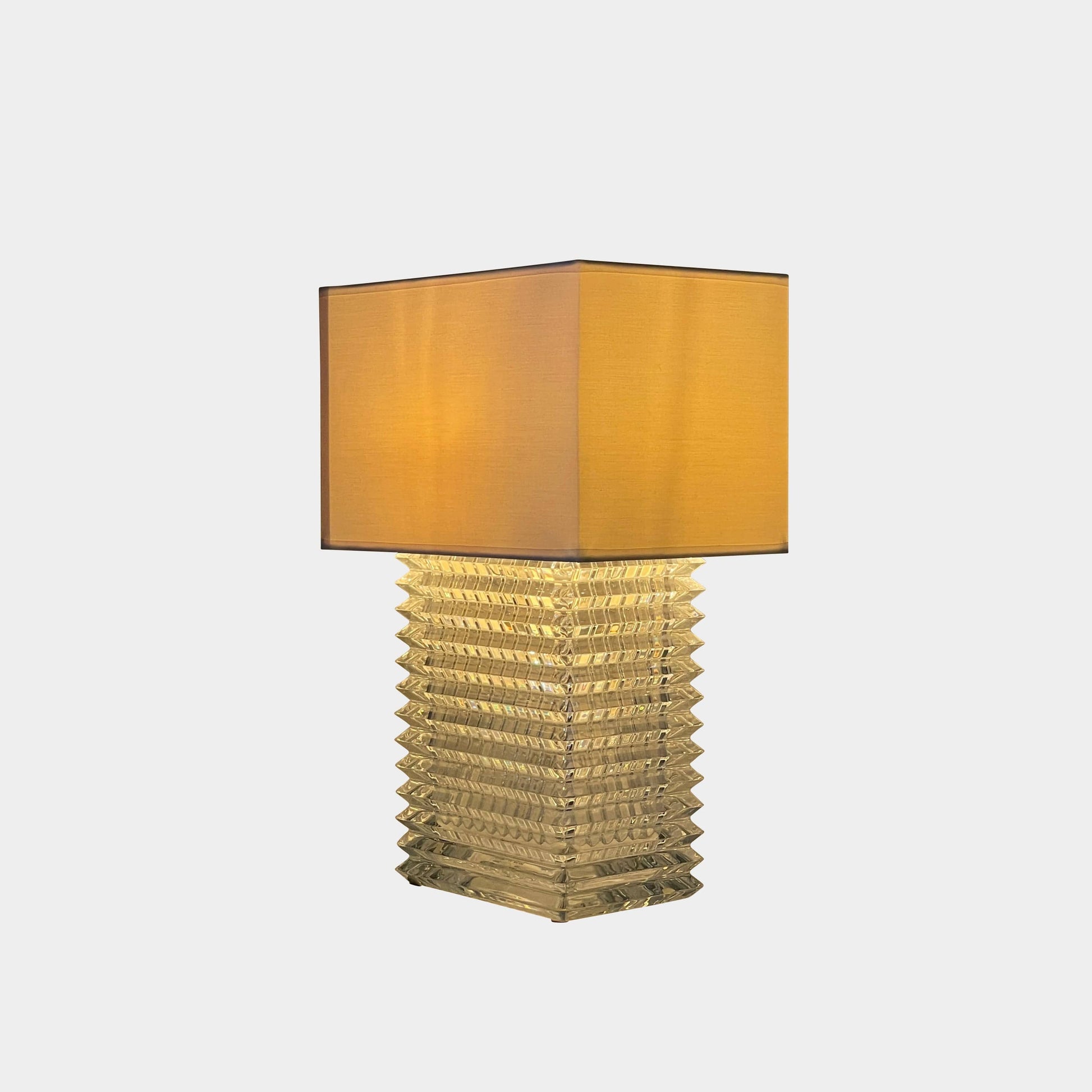 An elegant Baccarat Eye Table Lamp with a white shade designed by Nicolas Triboulot.