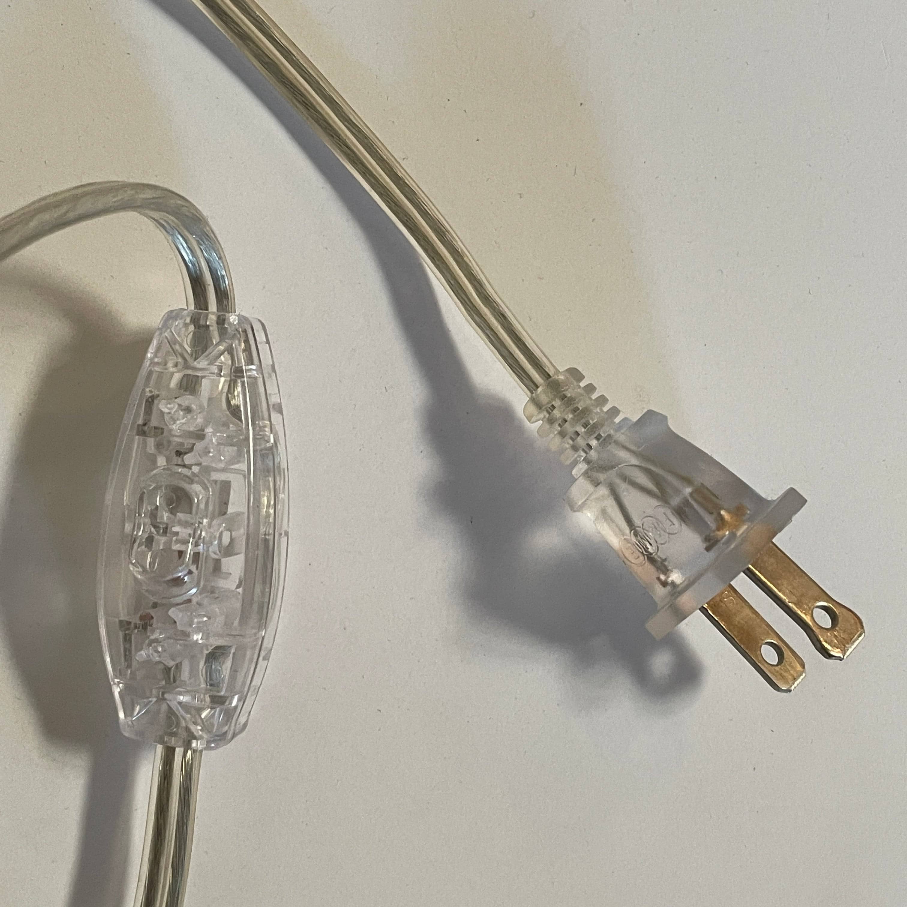 An elegant Baccarat Eye Table Lamp with a white shade designed by Nicolas Triboulot.