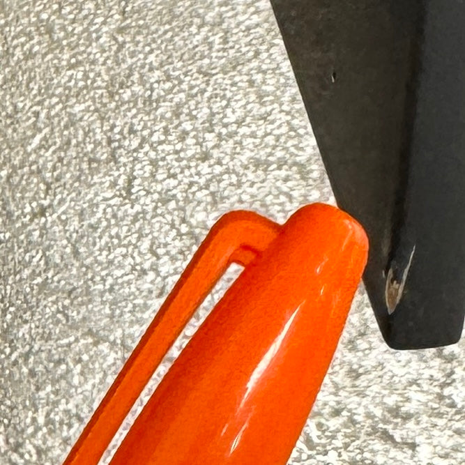 A pair of Poliform Dream Night Stands, each dark and rectangular with three drawers, stand side by side on a concrete floor against a plain white wall.