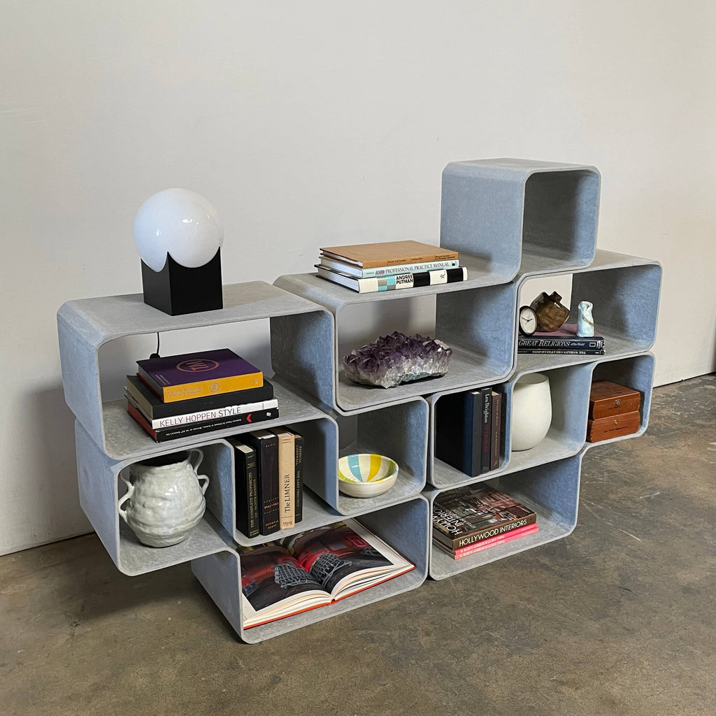 An Eternit Tetris Modular Shelving Unit made out of squares and rectangles.