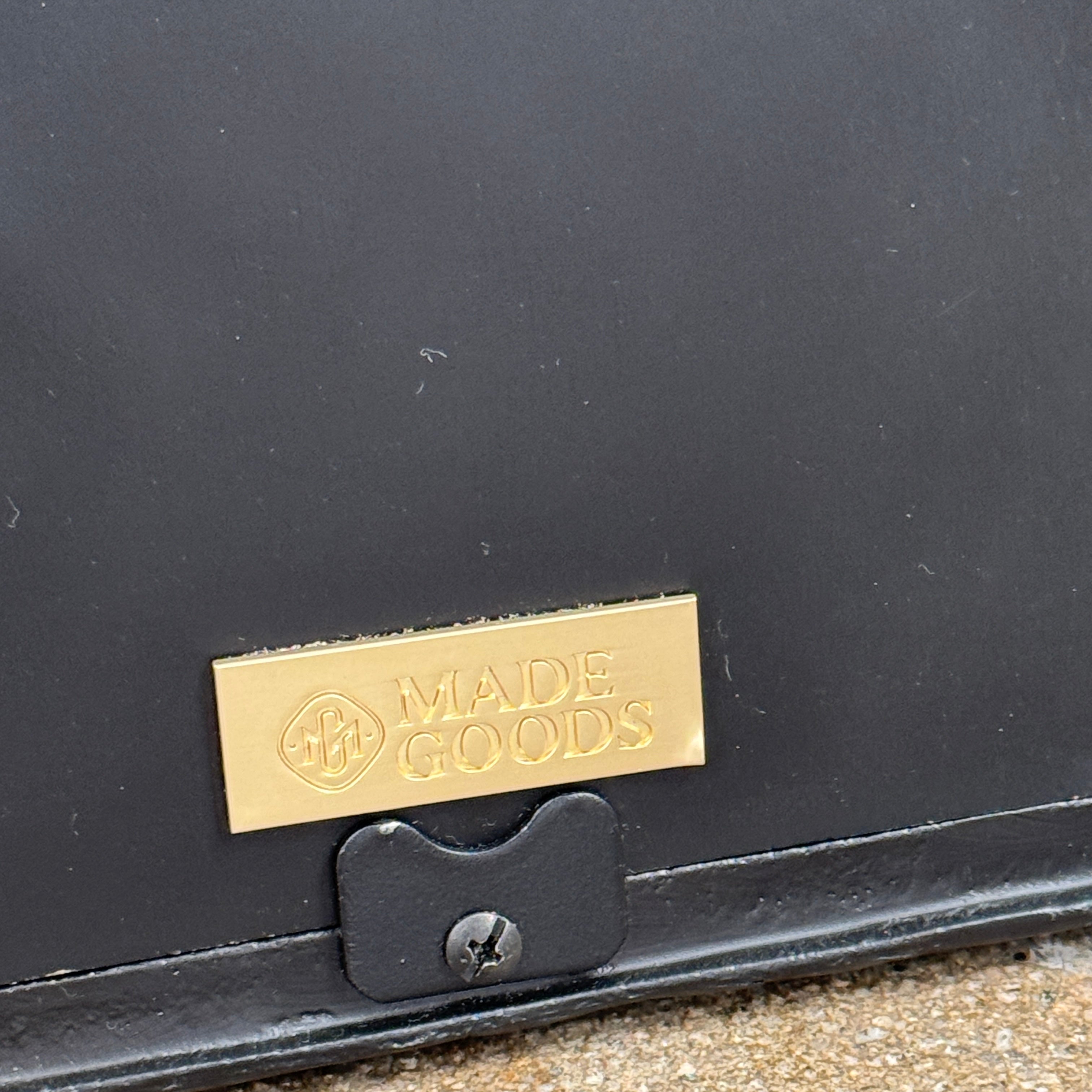 The Made Goods Joelle Three Birds Mirror is a rectangular wall mirror with a dark frame and three bird-shaped accents on its top edge, shown against a plain light background.