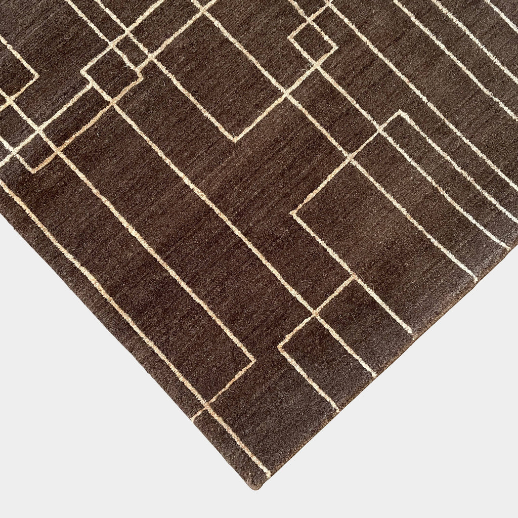 A brown and white geometric Delinear Presence wool rug featuring pure Himalayan wool fibers that retain natural lanolin.