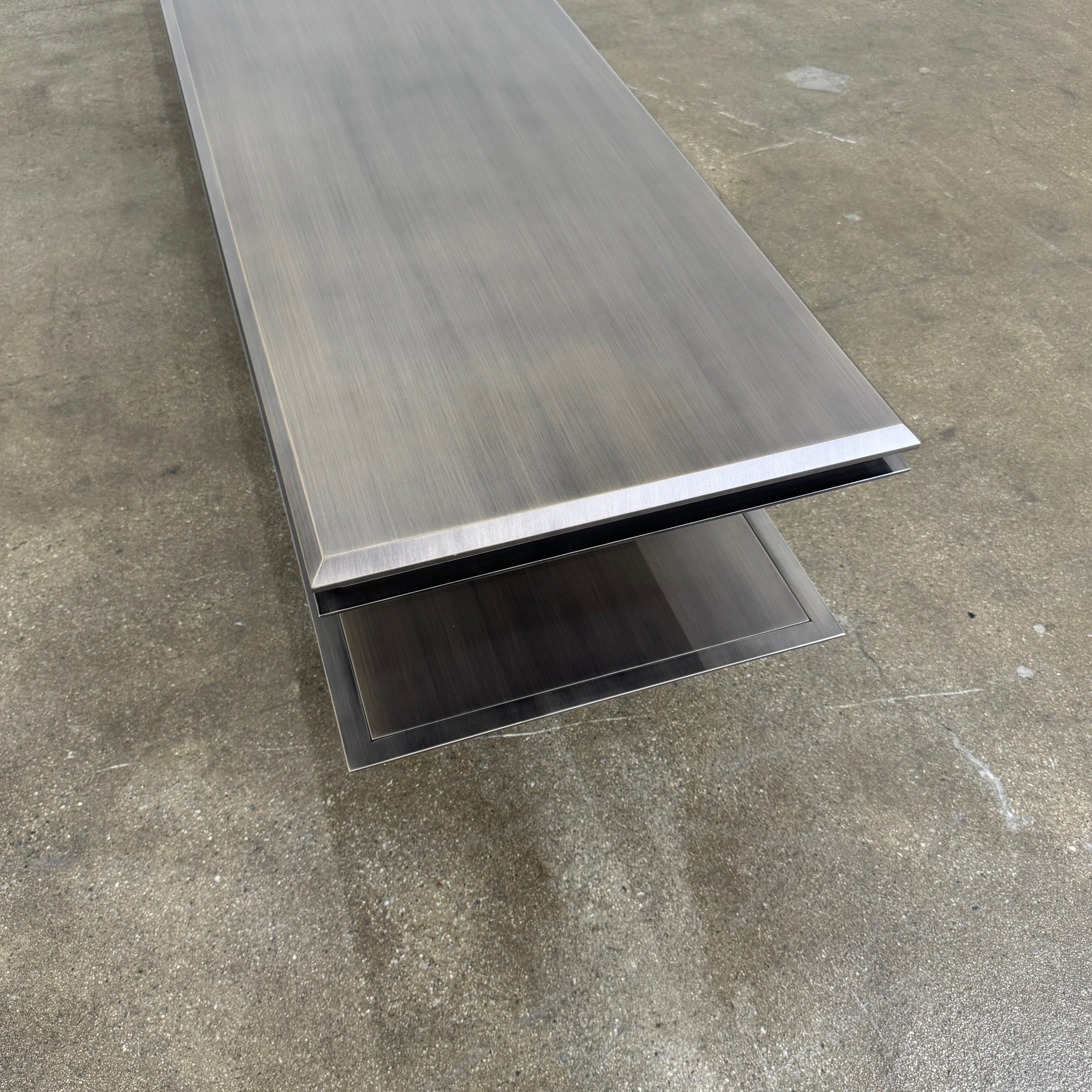 The Gallotti & Radice Pandora Console is a modern black TV stand featuring two open shelves and slim legs, shown on a plain white background. Check dimensions to ensure it fits your space perfectly.