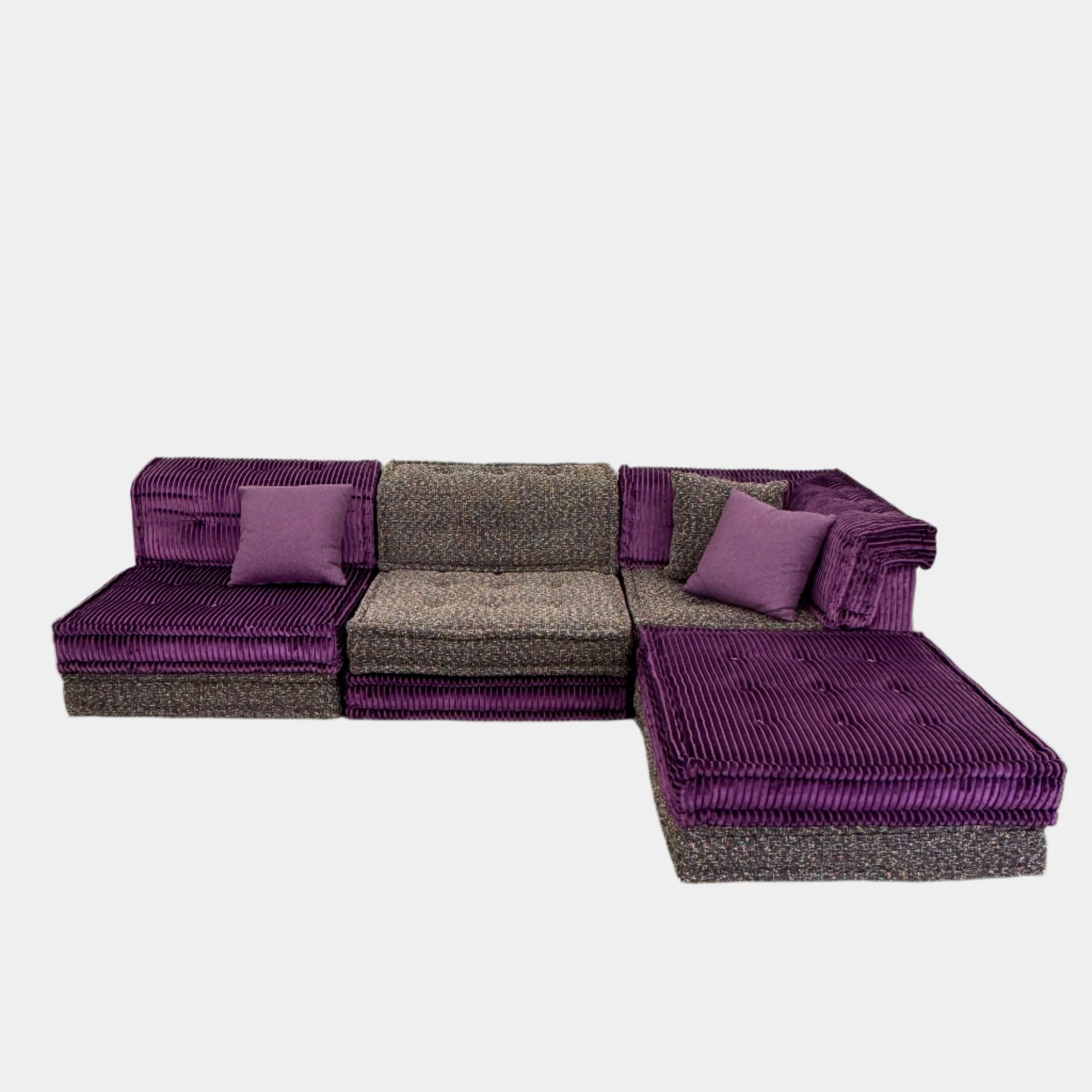The Roche Bobois Mah Jong Sectional - Back with Mechanism by Roche Bobois features a modern modular design, purple and gray corduroy upholstery, and includes two purple throw pillows, inspired by the iconic Mah Jong sofa.