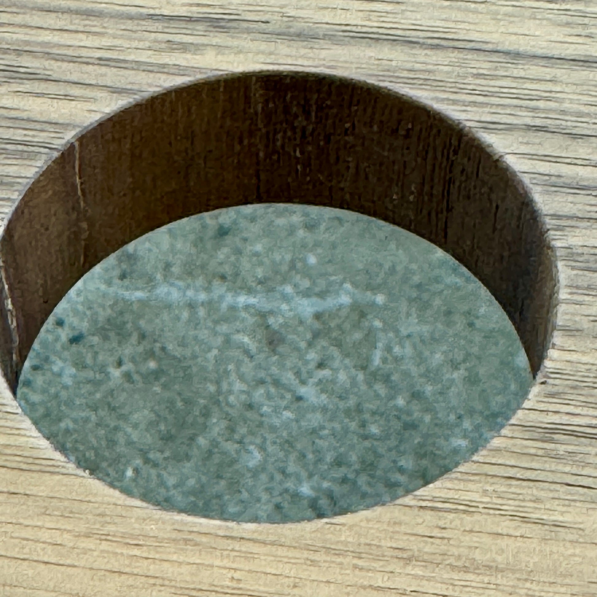 The Flexform Fly Canaletto Walnut Desk is a custom wood desk with a central circular cable management hole, reflecting the refined style of Flexform.