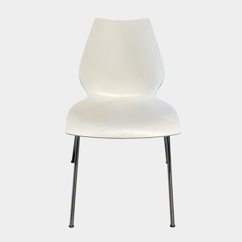 A comfortable Kartell Maui Dining Chair Set, elegantly positioned against a pristine white background.