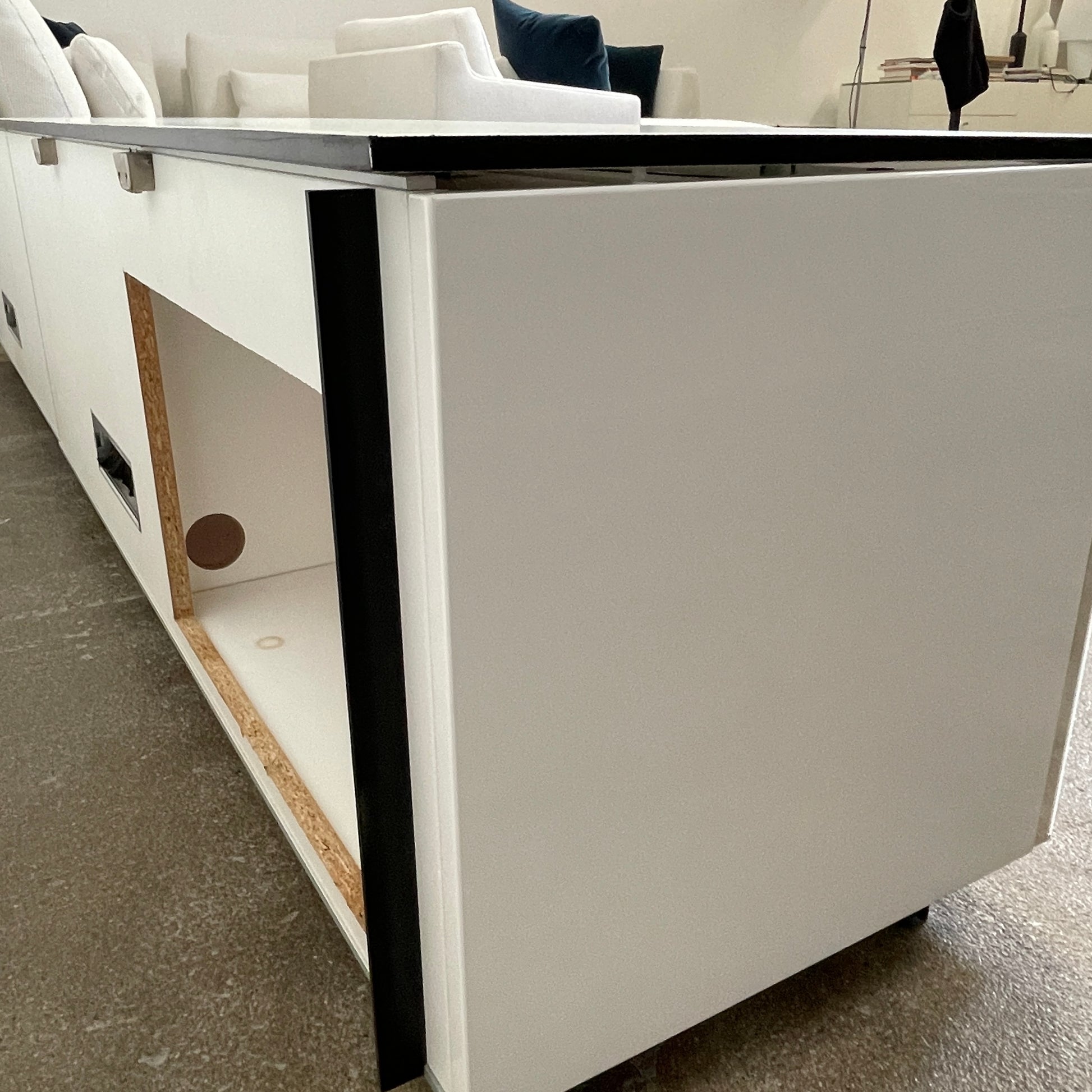 The B&B Italia Pab Low Console by B&B Italia is a rectangular, low-profile media console with glossy pearl white doors and two doors, perfect for stylish storage, shown against a plain white background.