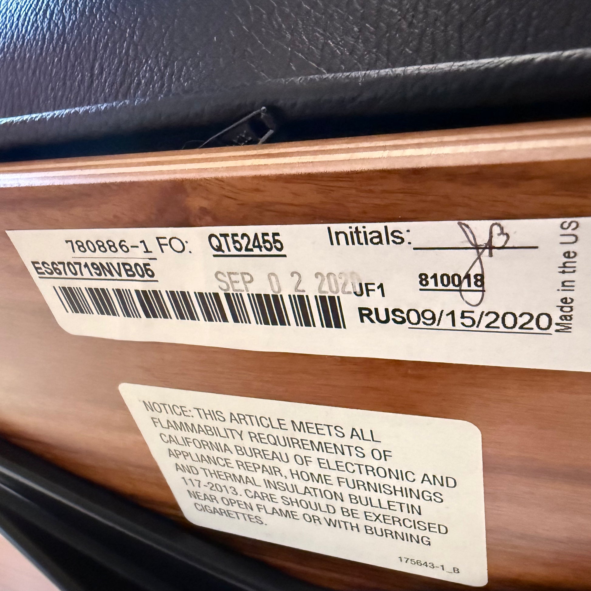 The MillerKnoll Herman Miller Eames Lounge Chair & Ottoman features black leather, wooden frames, and metal swivel bases, showcased against a white background—a timeless modern classic for sophisticated interiors.