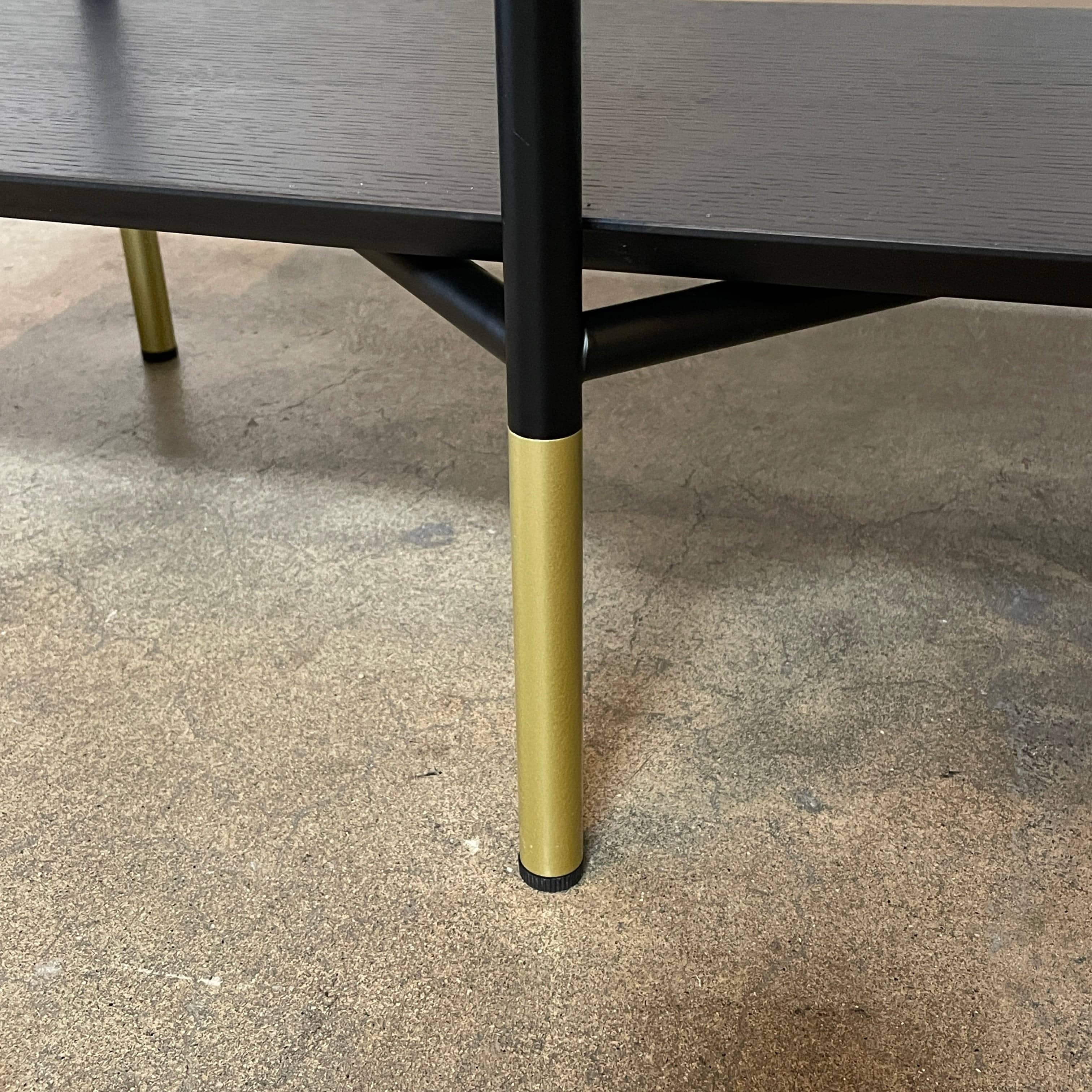 A Ligne Roset Clyde Bookcase with a mesh back.