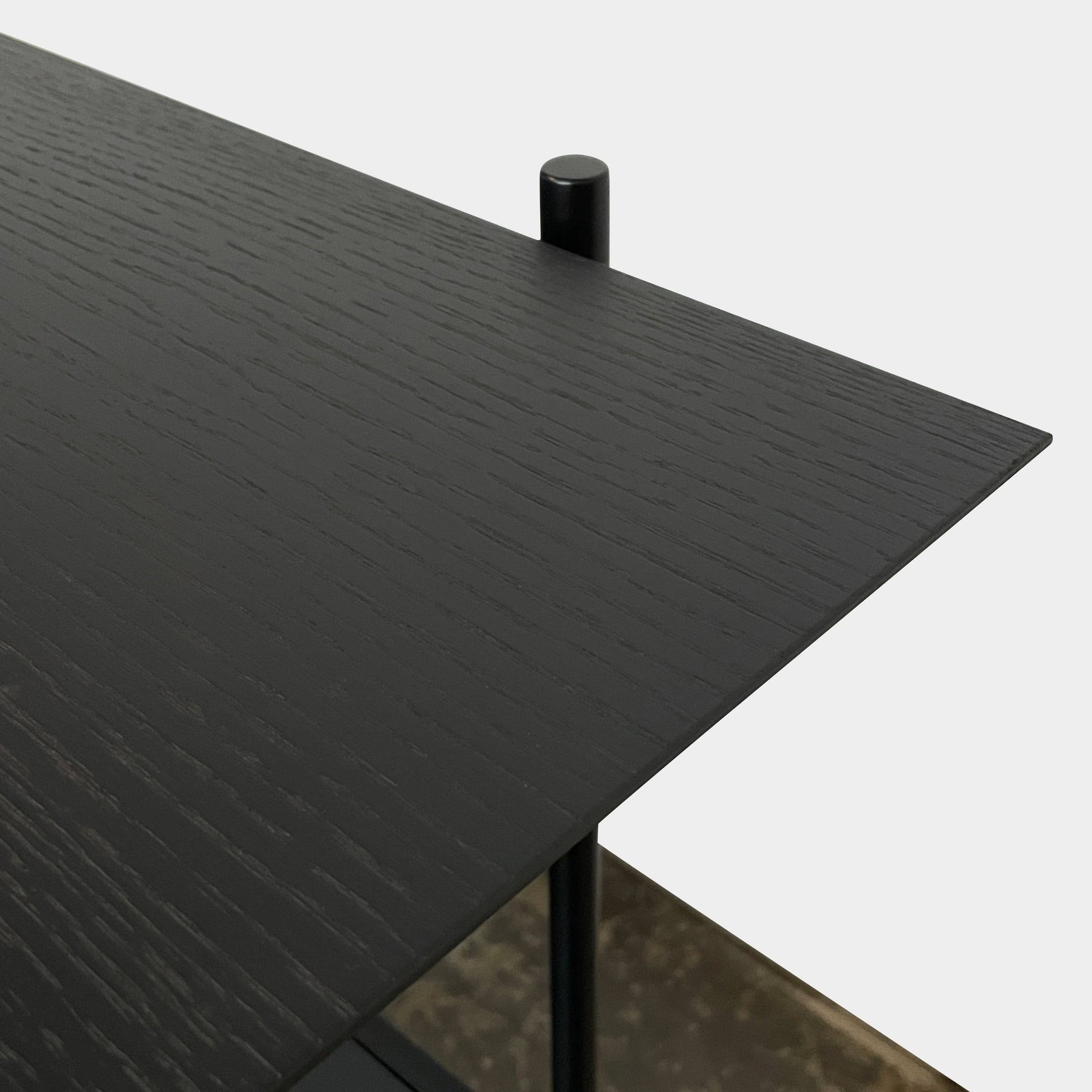 A Ligne Roset Clyde Bookcase with a mesh back.