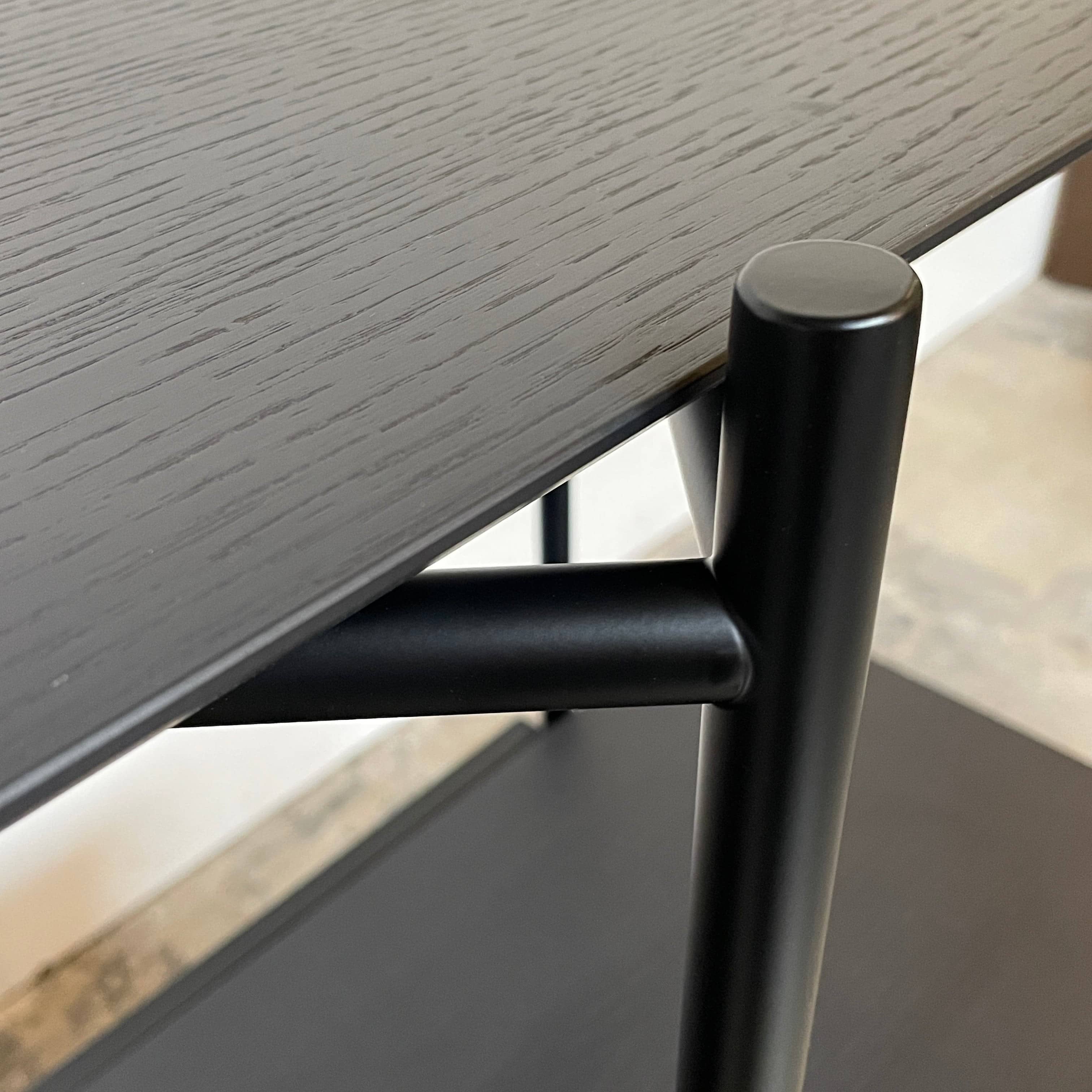 A Ligne Roset Clyde Bookcase with a mesh back.