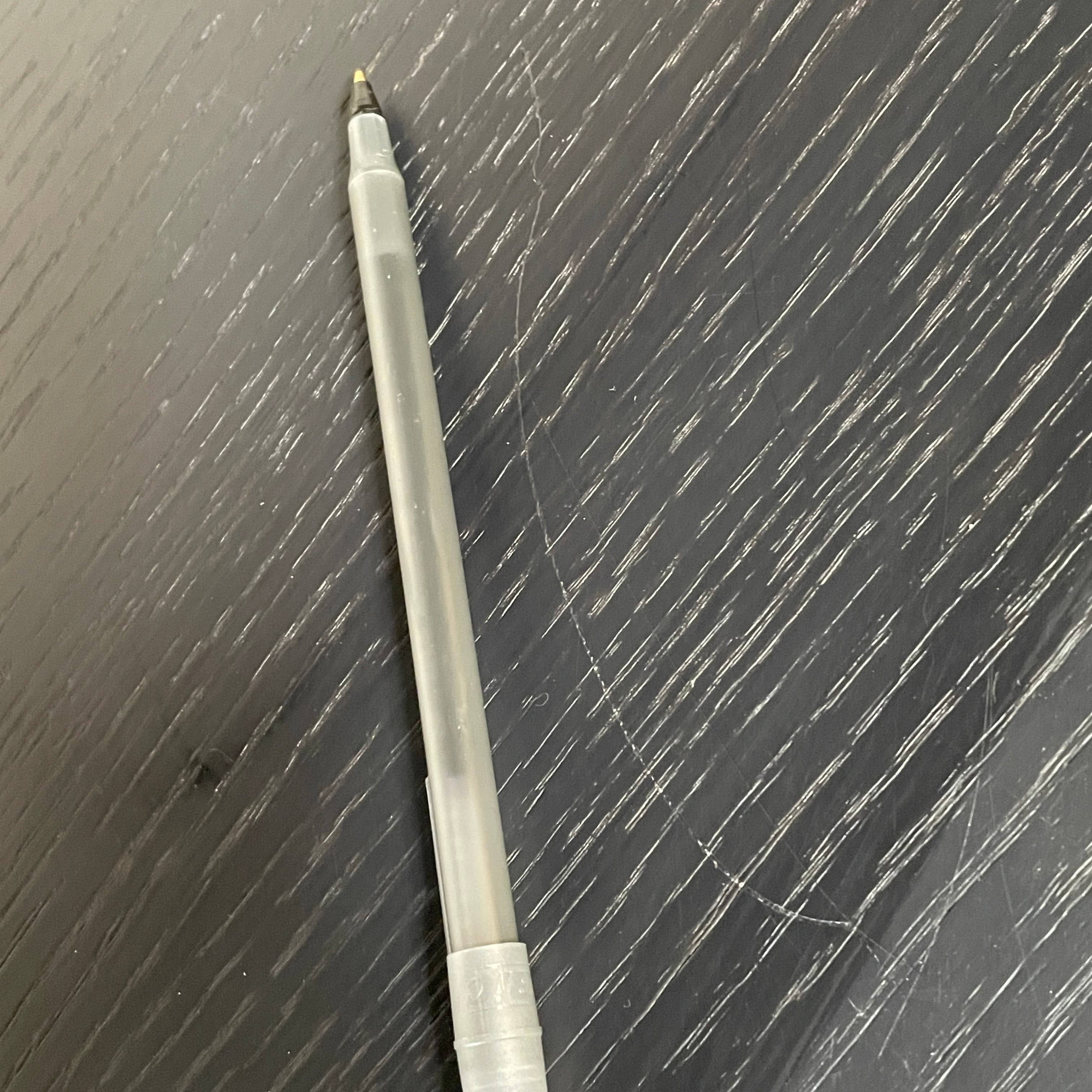 A Ligne Roset Clyde Bookcase with a mesh back.