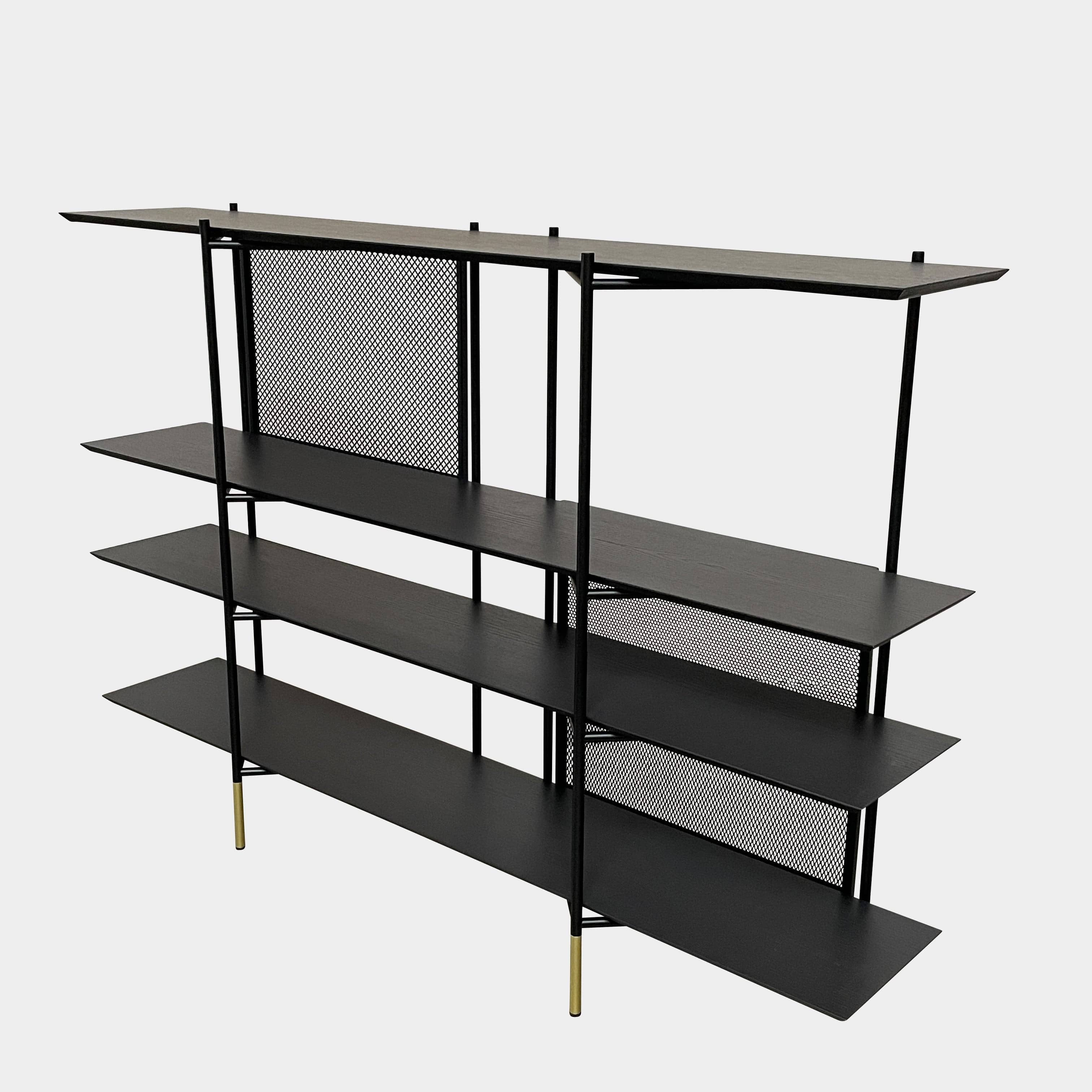 A Ligne Roset Clyde Bookcase with a mesh back.