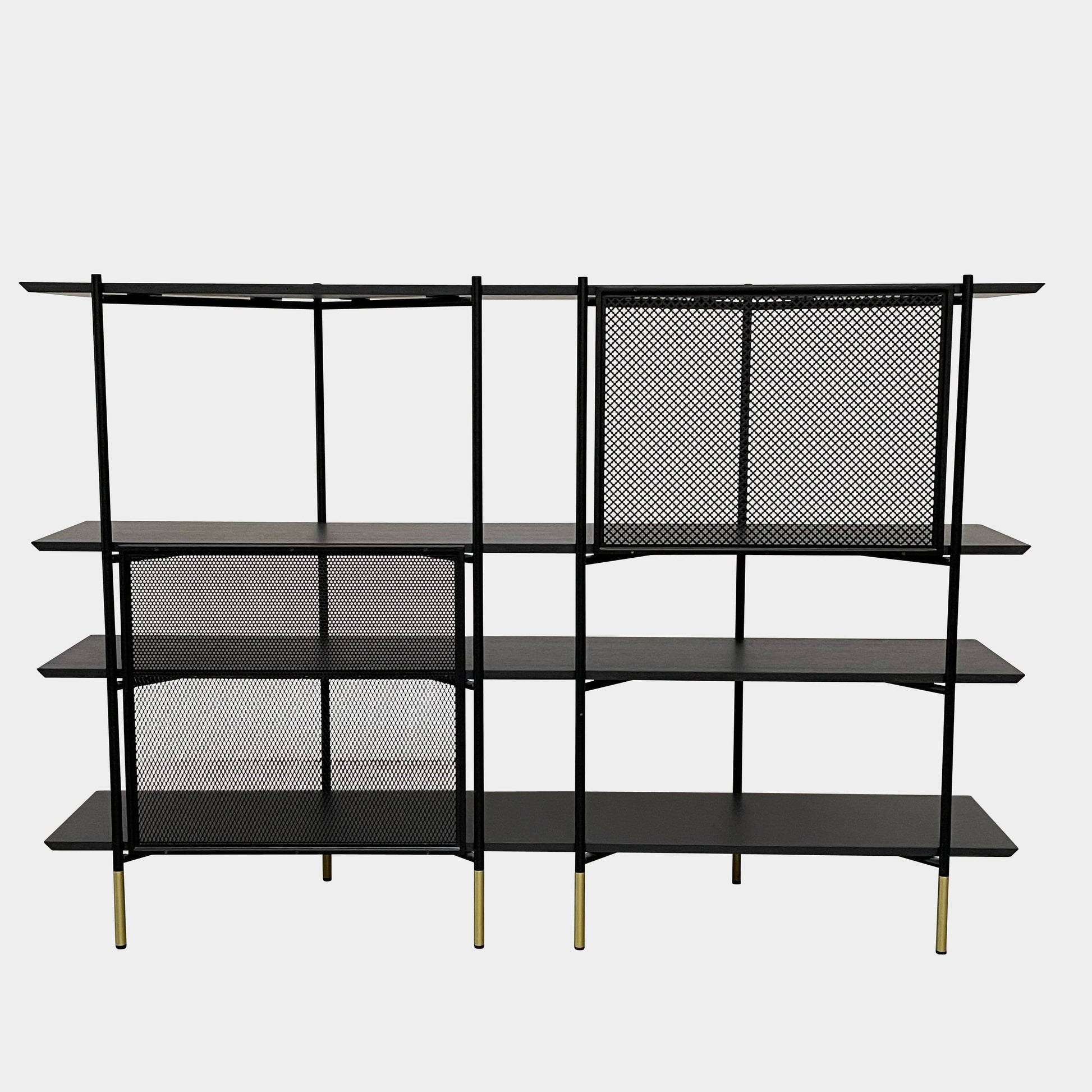 A Ligne Roset Clyde Bookcase with a mesh back.