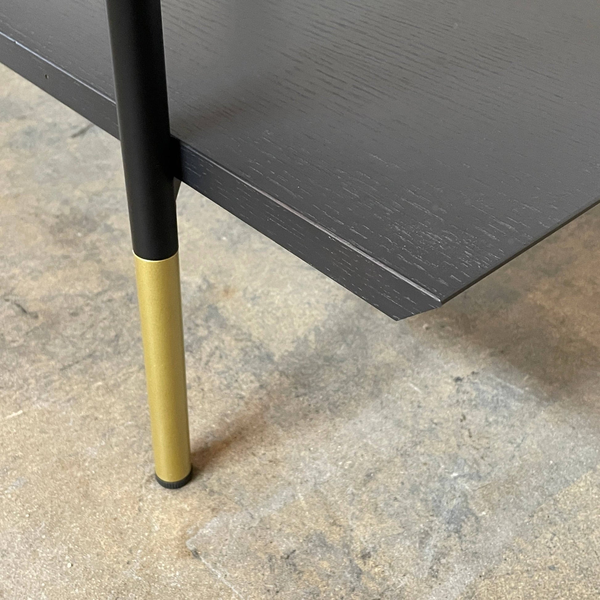 A Ligne Roset Clyde Bookcase with a mesh back.