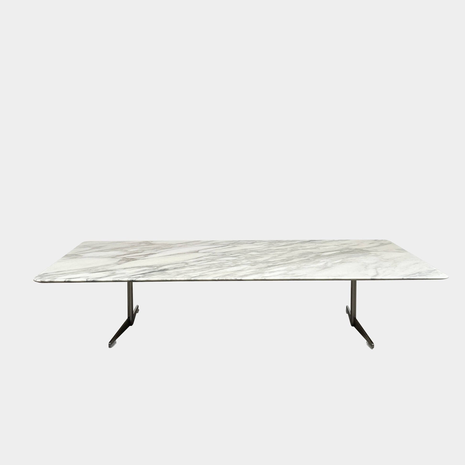 A Flexform Fly Marble Coffee Table with black legs on a white background.