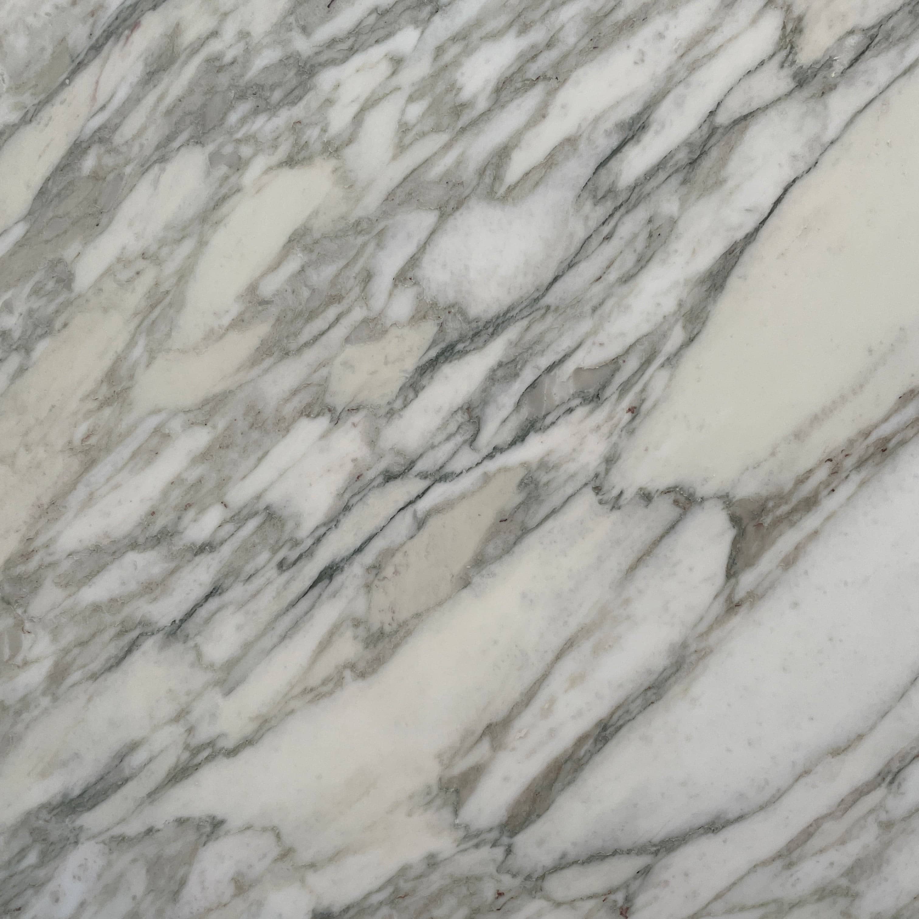 A Flexform Fly Marble Coffee Table with black legs on a white background.