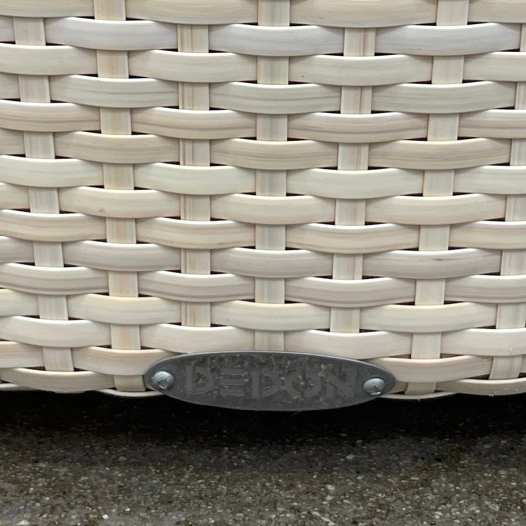 Experience the elegance of Richard Frinier Design with Dedon's Orbit Swivel Sofa Set, including a curved sofa with an adjustable canopy, ottoman, and side table. Cream-colored cushions add style and comfort to your outdoor ensemble.