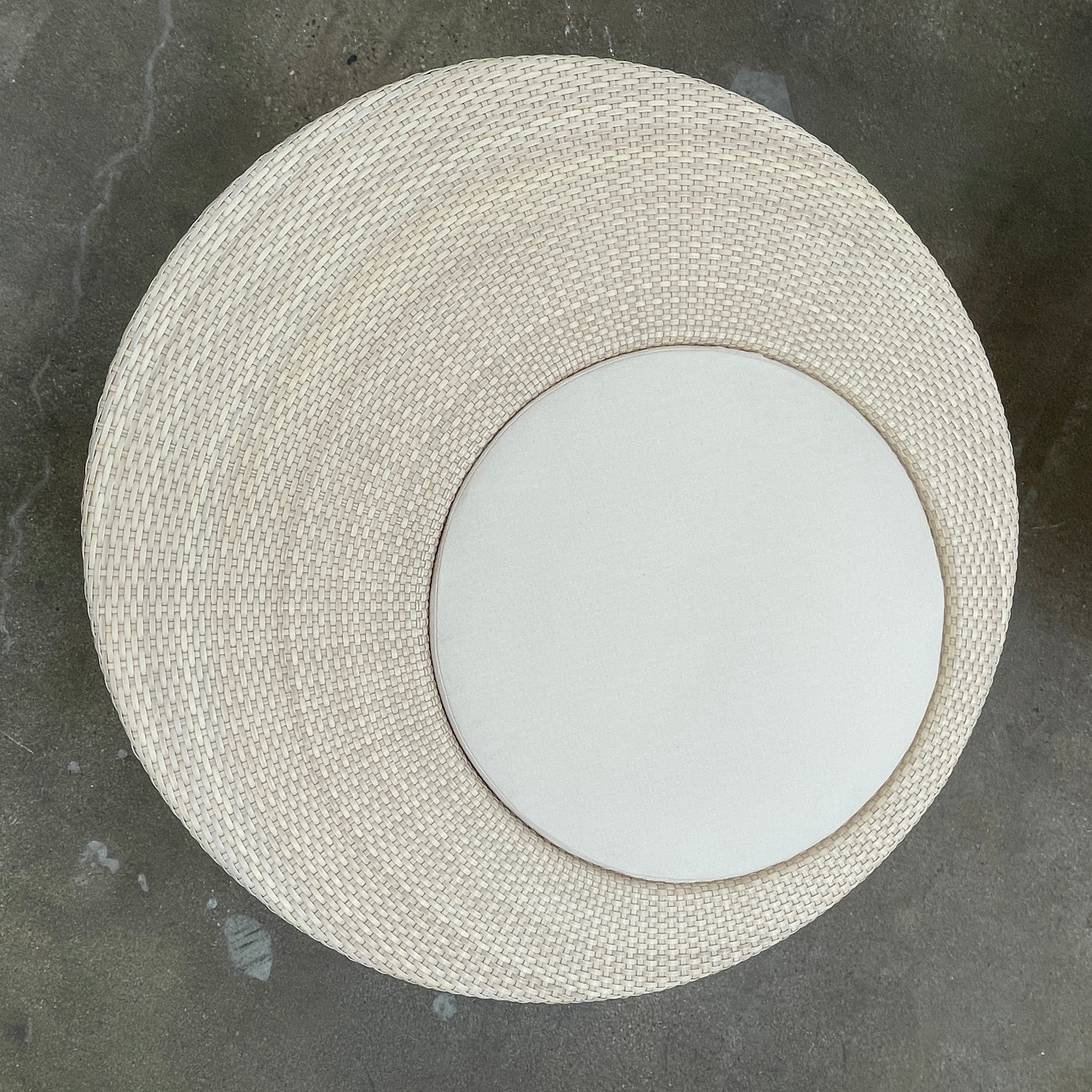 Experience the elegance of Richard Frinier Design with Dedon's Orbit Swivel Sofa Set, including a curved sofa with an adjustable canopy, ottoman, and side table. Cream-colored cushions add style and comfort to your outdoor ensemble.