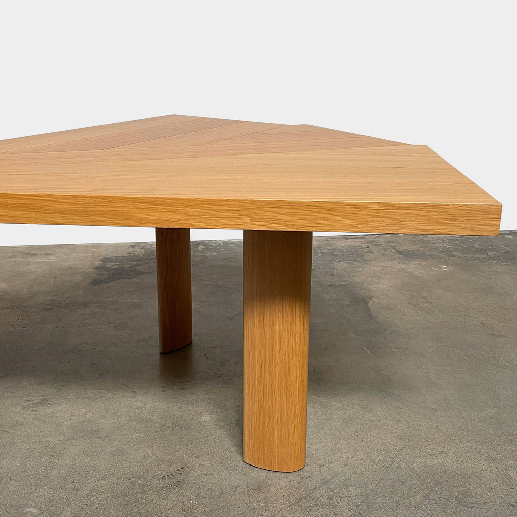 A Cassina Ventaglio Table with a curved shape.