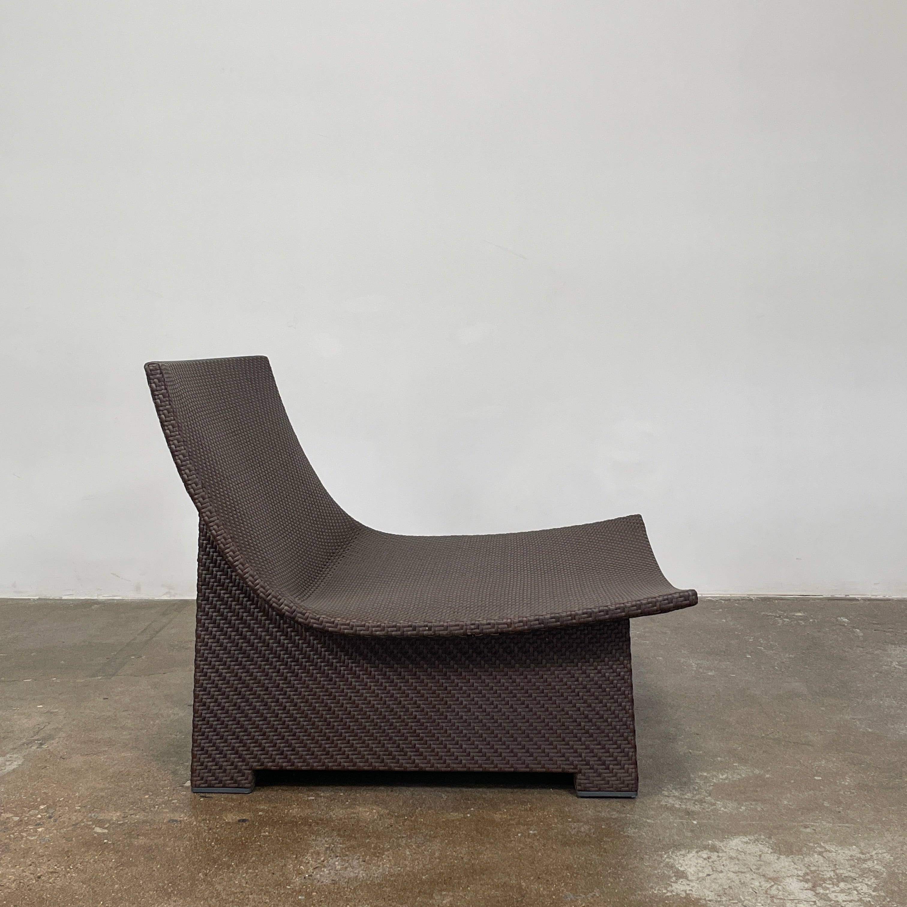 The Dedon Spa Outdoor Lounge Chairs set features two cream-cushioned seats made with proprietary fiber, beautifully displayed side by side against a simple white backdrop.