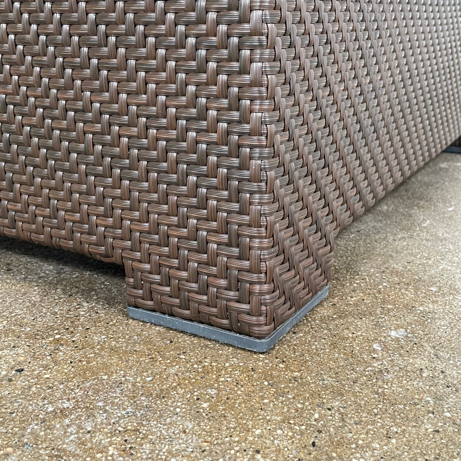 The Dedon Spa Outdoor Lounge Chairs set features two cream-cushioned seats made with proprietary fiber, beautifully displayed side by side against a simple white backdrop.