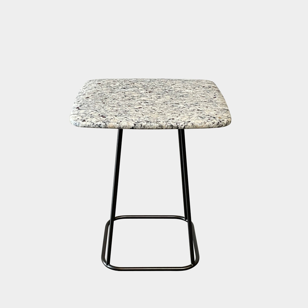 A Draenert Manolo Side Table with a natural stone marble top.