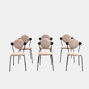 Set of 6 La Chance Planet Dining Chairs featuring round beige cushions, black metal legs, and black circular back accents. Arranged in two rows on a plain background and inspired by La Chance’s contemporary elegance.