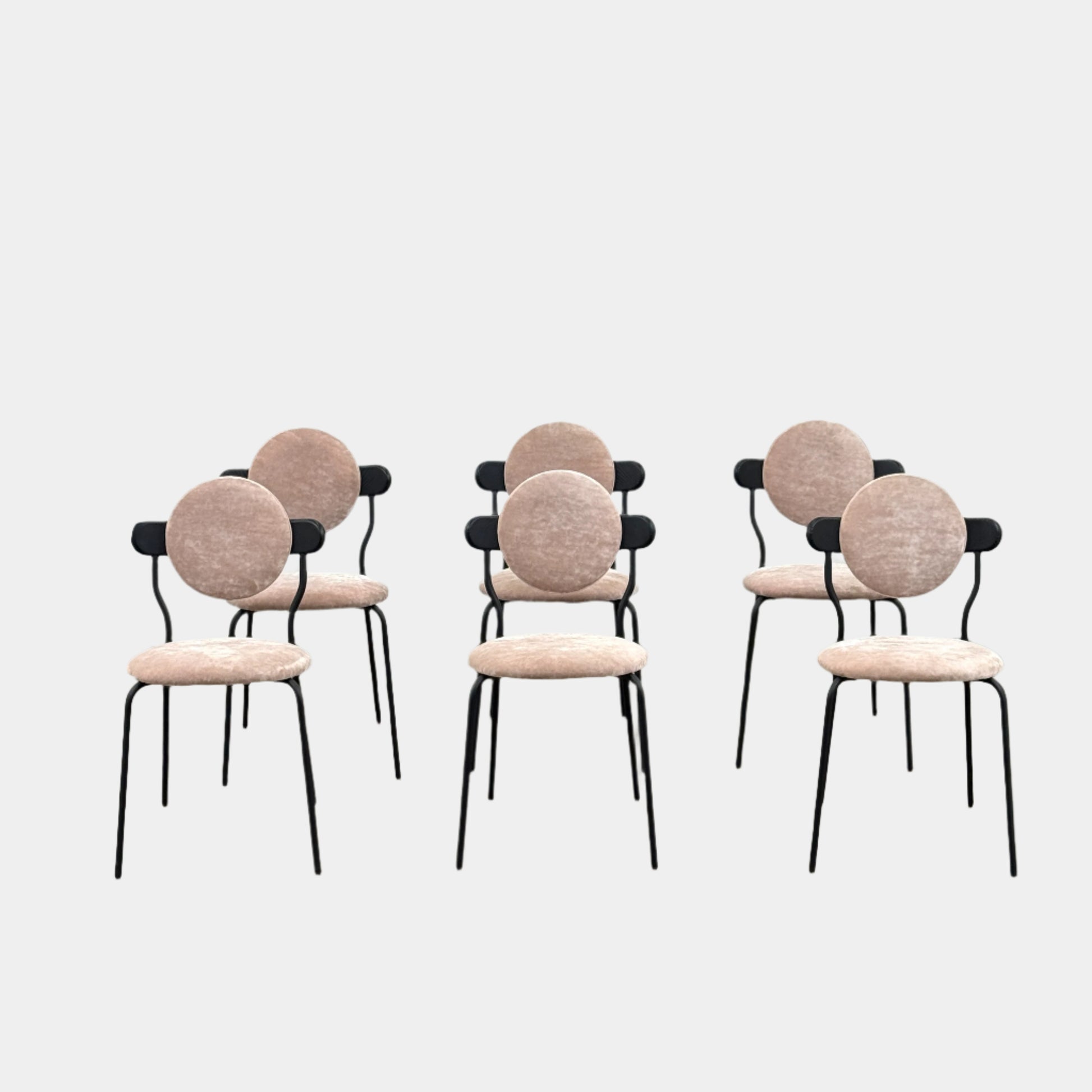 Set of 6 La Chance Planet Dining Chairs featuring round beige cushions, black metal legs, and black circular back accents. Arranged in two rows on a plain background and inspired by La Chance’s contemporary elegance.