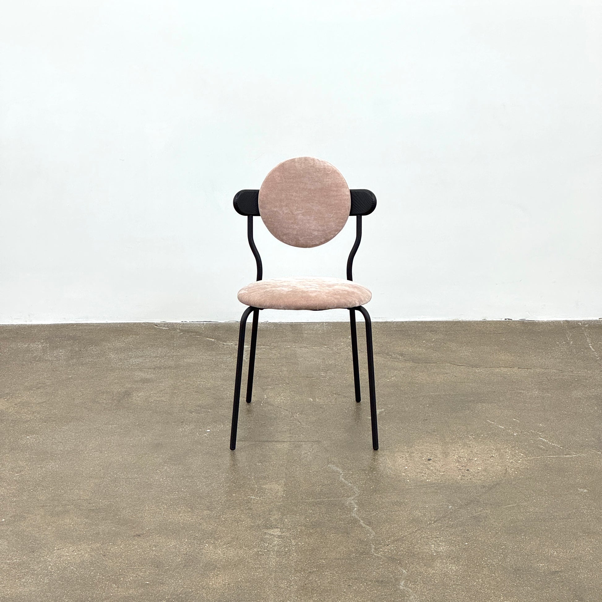 Set of 6 La Chance Planet Dining Chairs featuring round beige cushions, black metal legs, and black circular back accents. Arranged in two rows on a plain background and inspired by La Chance’s contemporary elegance.