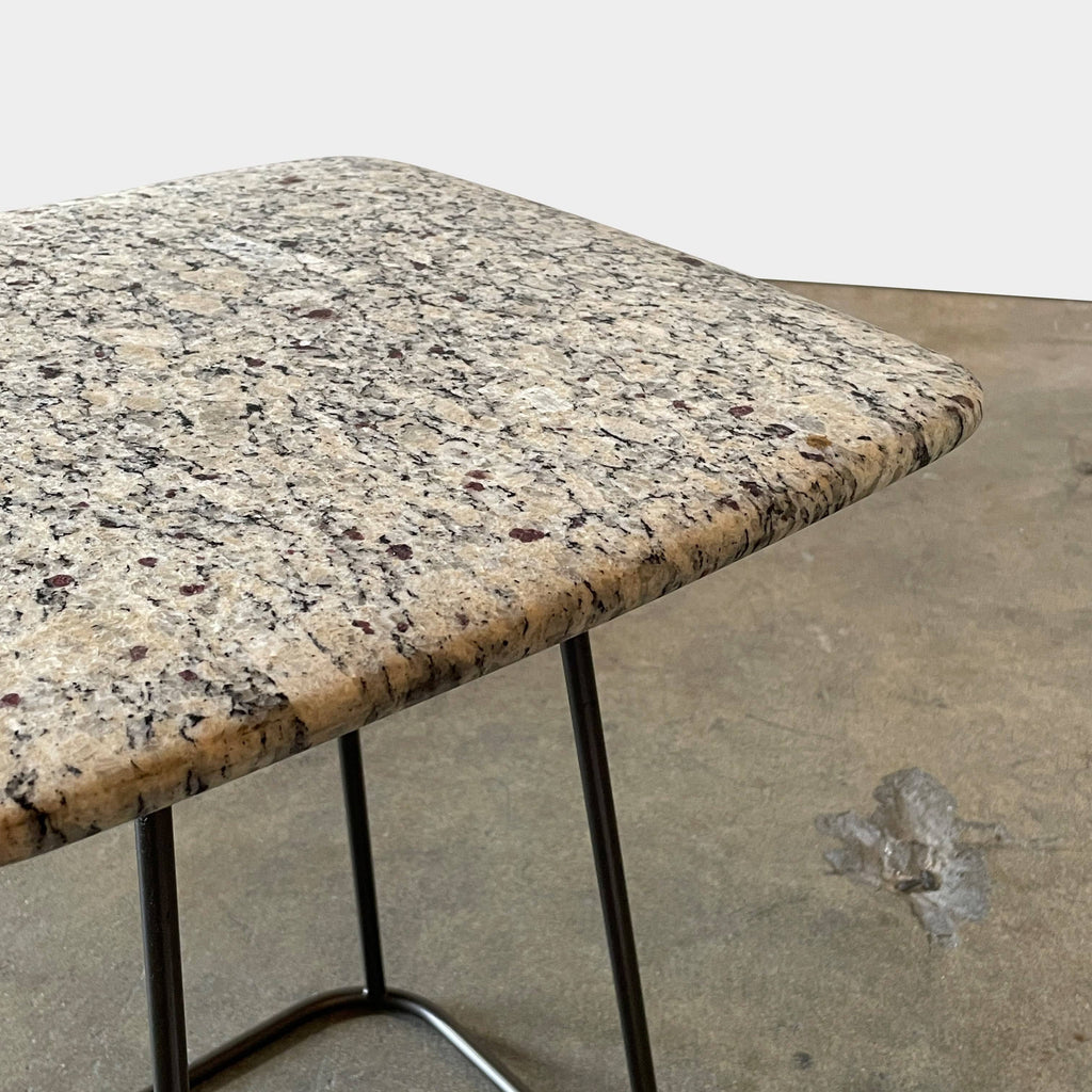 A Draenert Manolo Side Table with a natural stone marble top.