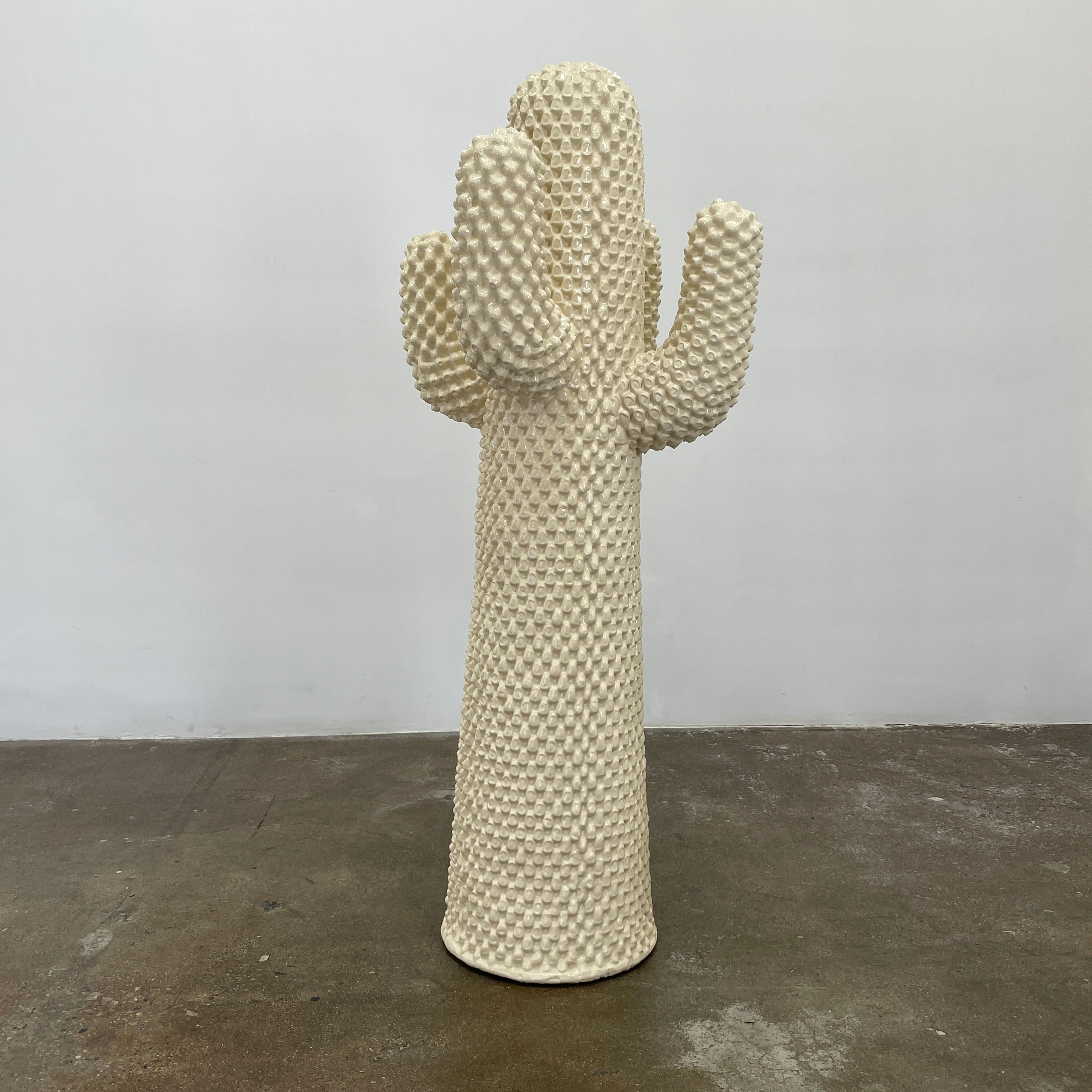The Gufram Another White Cactus Coat Stand / Sculpture, a textured white piece inspired by iconic Italian design, stands upright against a plain white background.