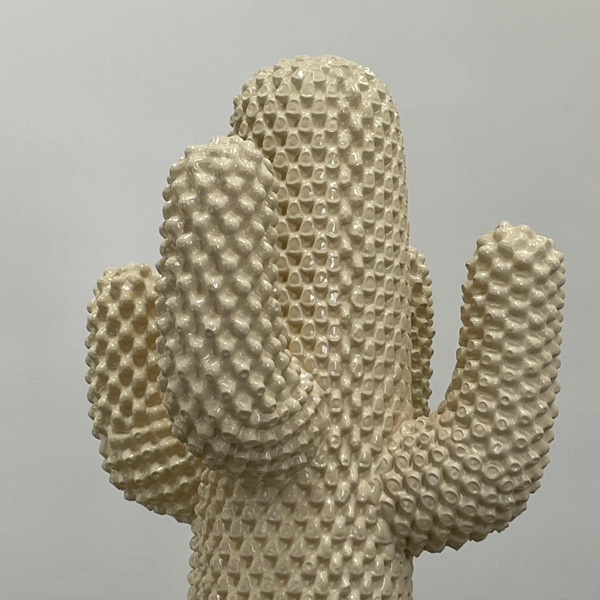 The Gufram Another White Cactus Coat Stand / Sculpture, a textured white piece inspired by iconic Italian design, stands upright against a plain white background.
