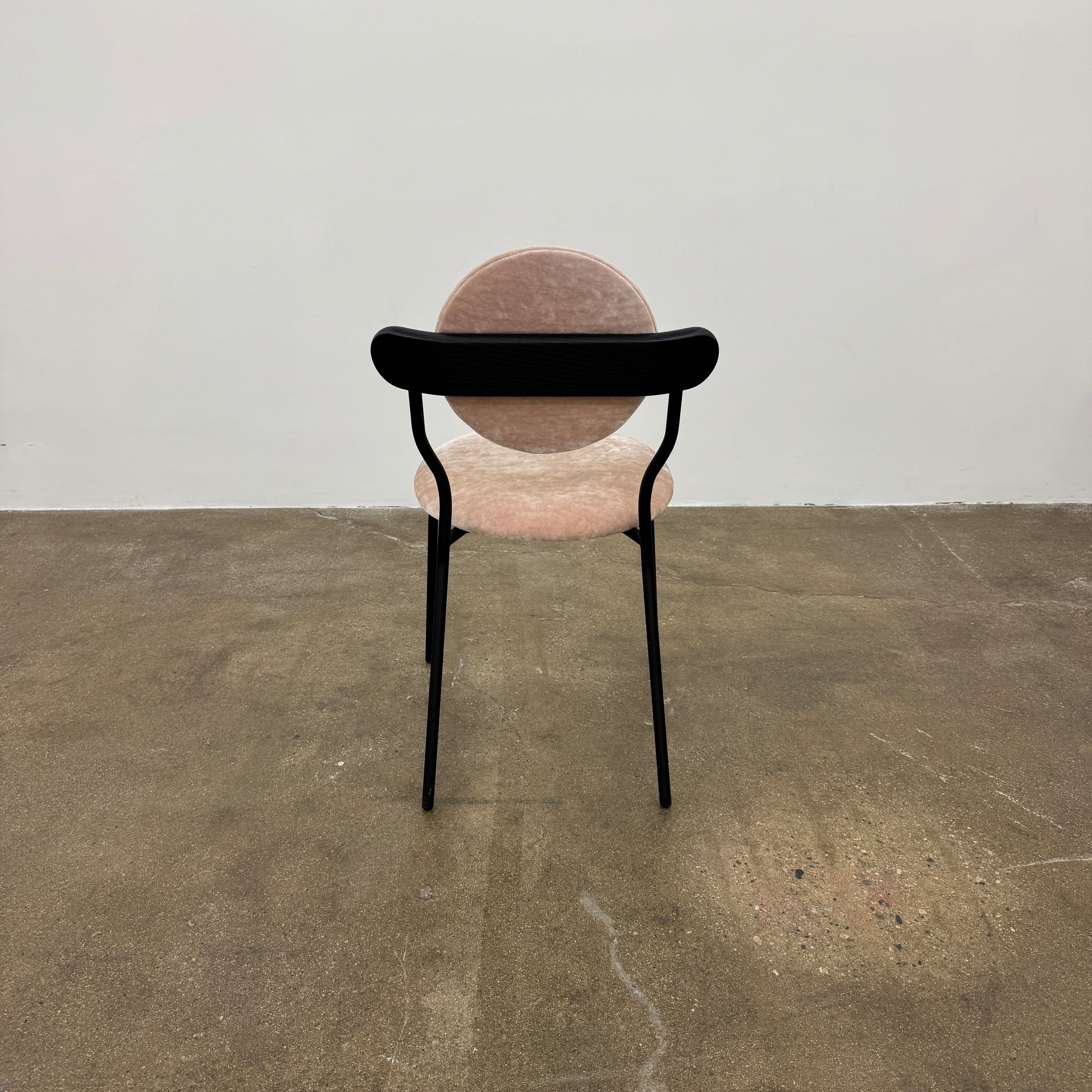 Set of 6 La Chance Planet Dining Chairs featuring round beige cushions, black metal legs, and black circular back accents. Arranged in two rows on a plain background and inspired by La Chance’s contemporary elegance.