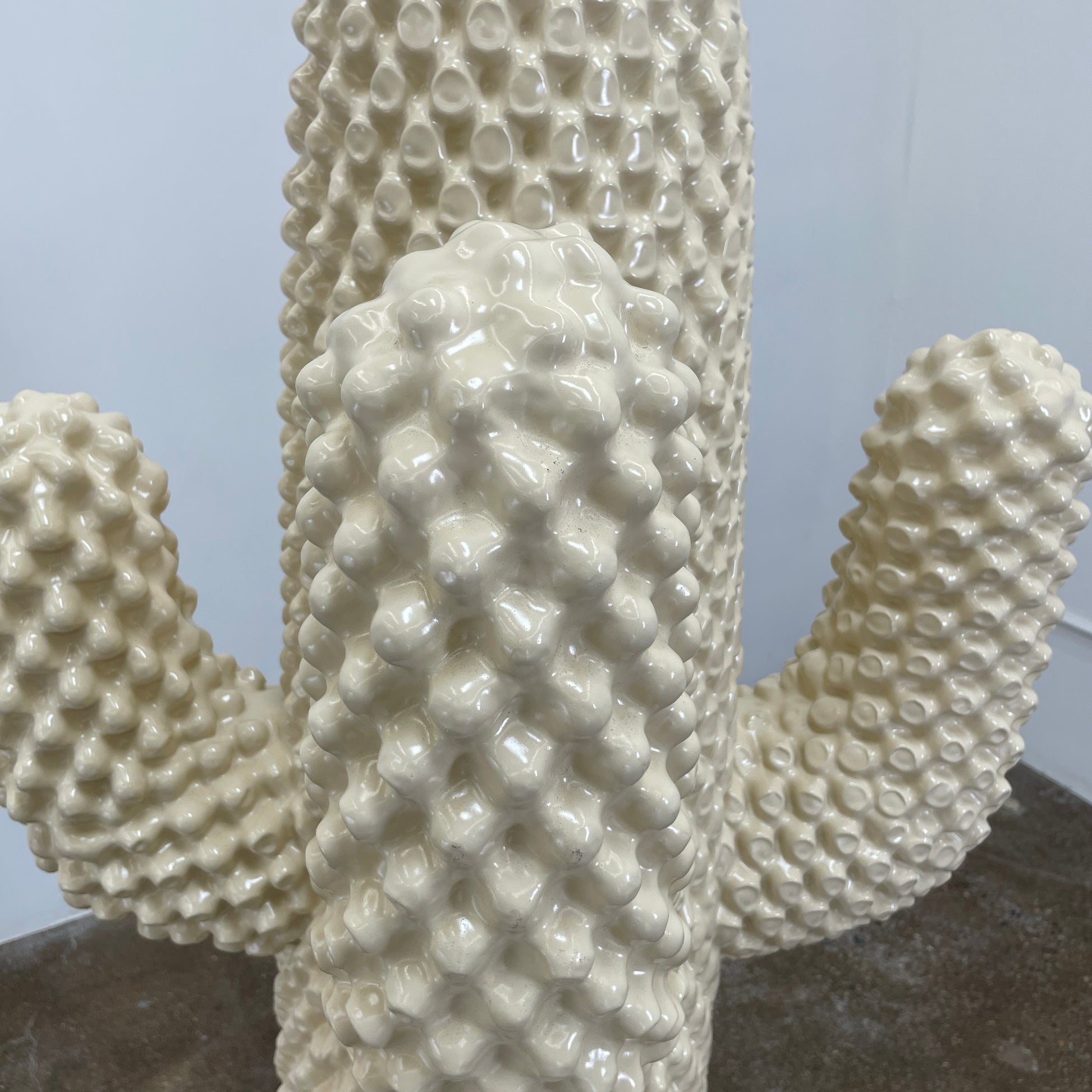The Gufram Another White Cactus Coat Stand / Sculpture, a textured white piece inspired by iconic Italian design, stands upright against a plain white background.