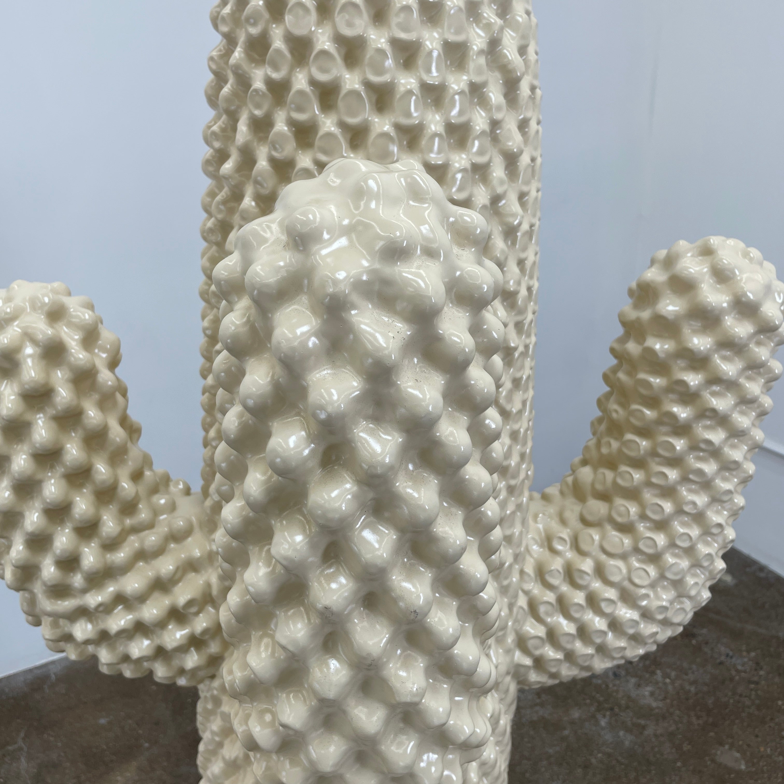 The Gufram Another White Cactus Coat Stand / Sculpture, a textured white piece inspired by iconic Italian design, stands upright against a plain white background.
