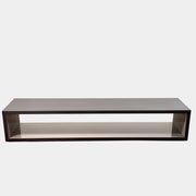 The B&B Italia Frank Low Console by B&B Italia features a sleek black rectangular frame with clear glass, making it an ideal modern low sofa back table inspired by contemporary elegance.