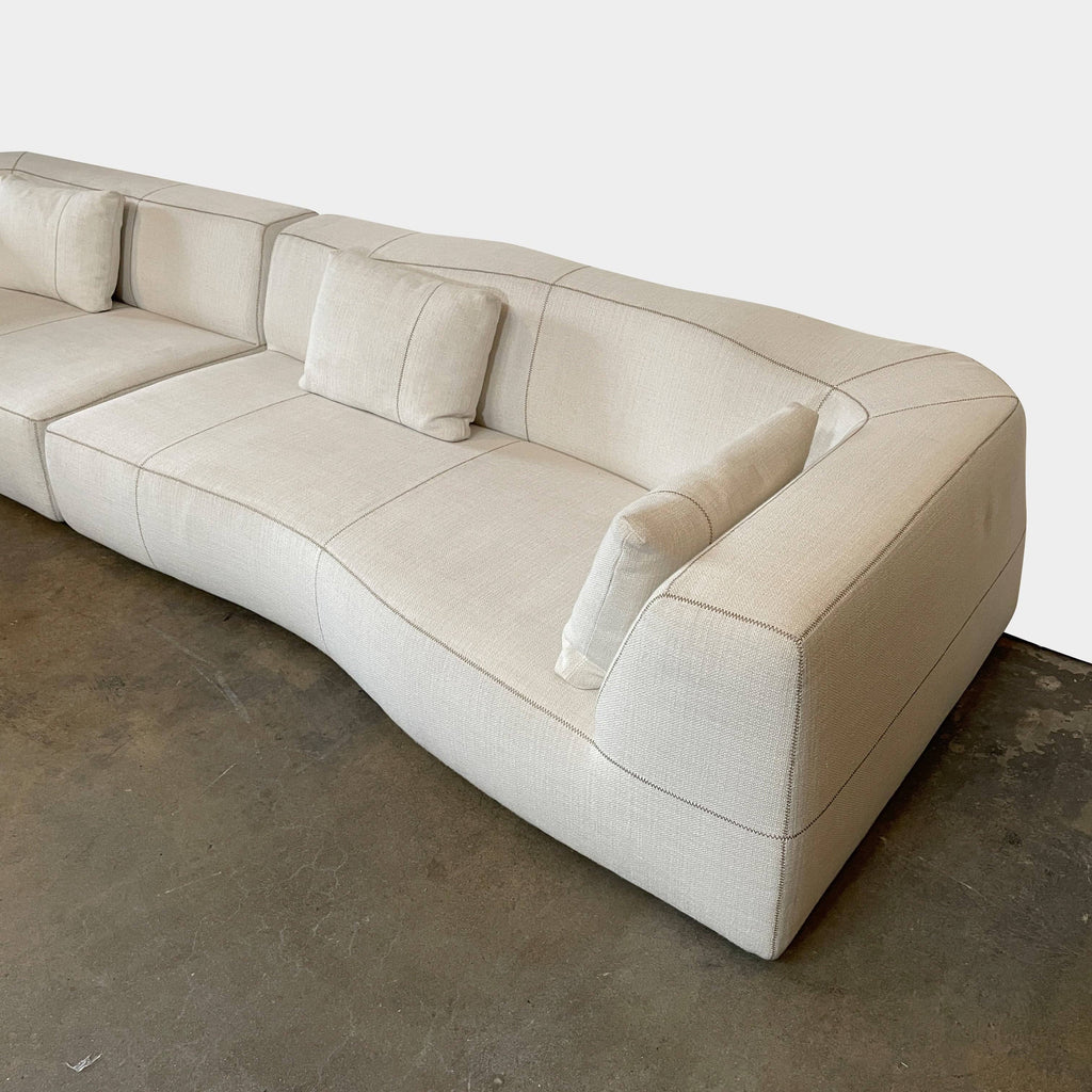 A white B&B Italia Bend Sectional sofa on a white background.