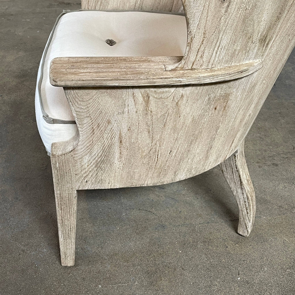 A Formations wooden barrel chair.