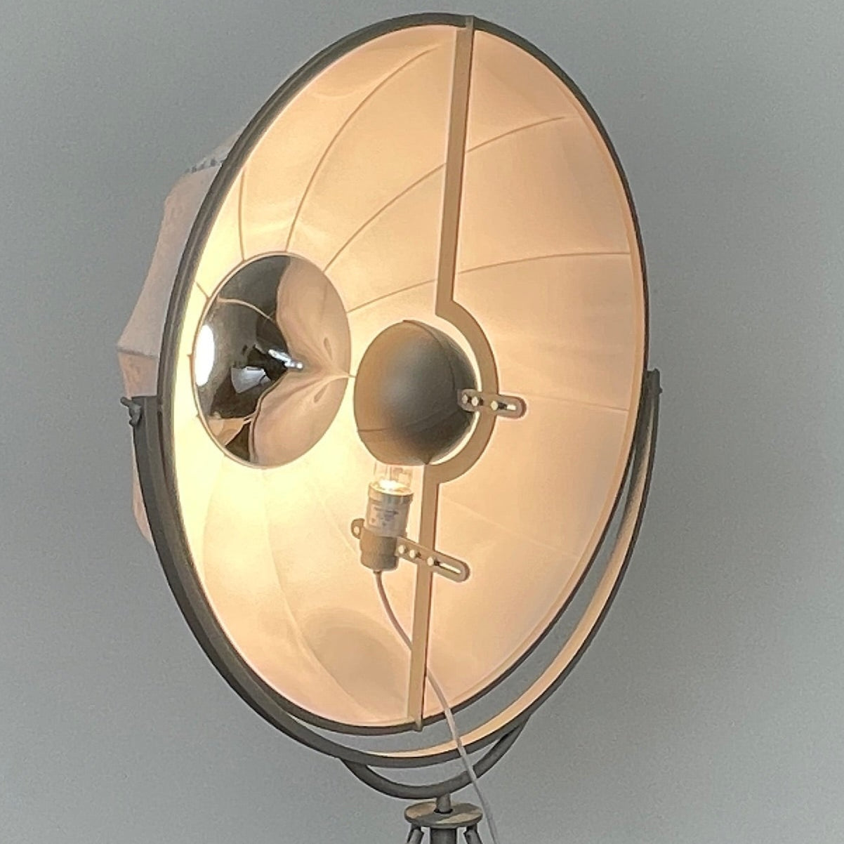 The Pallucco Italia Fortuny Ornament Floor Lamp, with its visible bulb and patterned spherical shade, gracefully stands on a plain white background, epitomizing the elegance of Pallucco Italia.