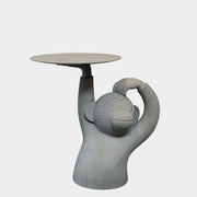 A BD Barcelona Monkey Side Table placed on top of a table.